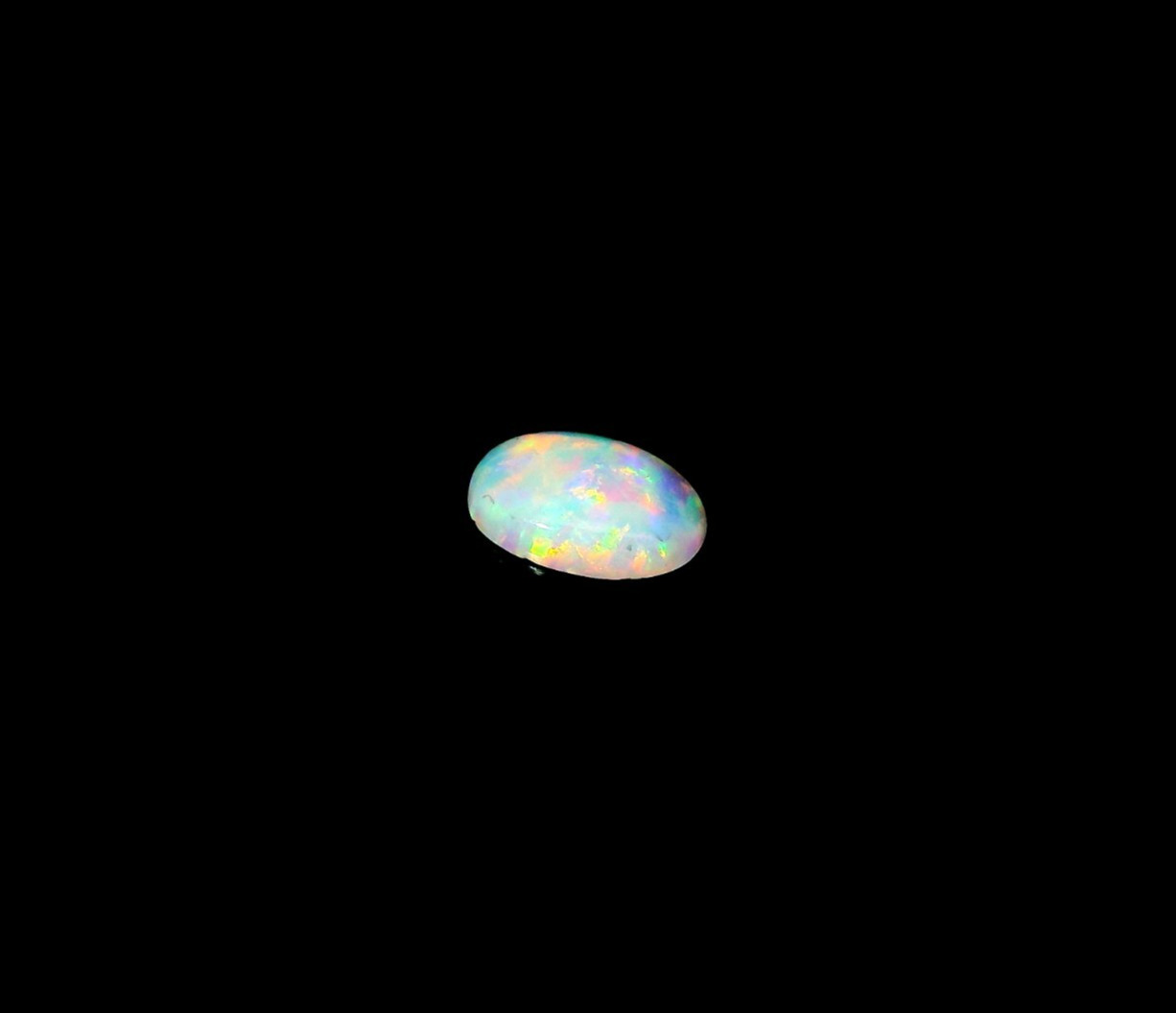 0.36ct Oval Shape White Blue Multi-Color Opal 7 x 5 mm