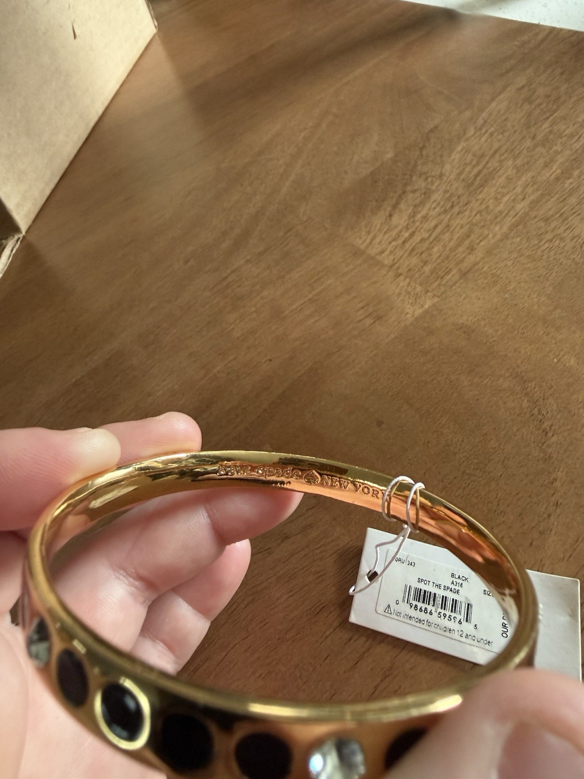 Kate Spade Bracelet Bangle “Spot the Spade” Gold Tone Bracelet