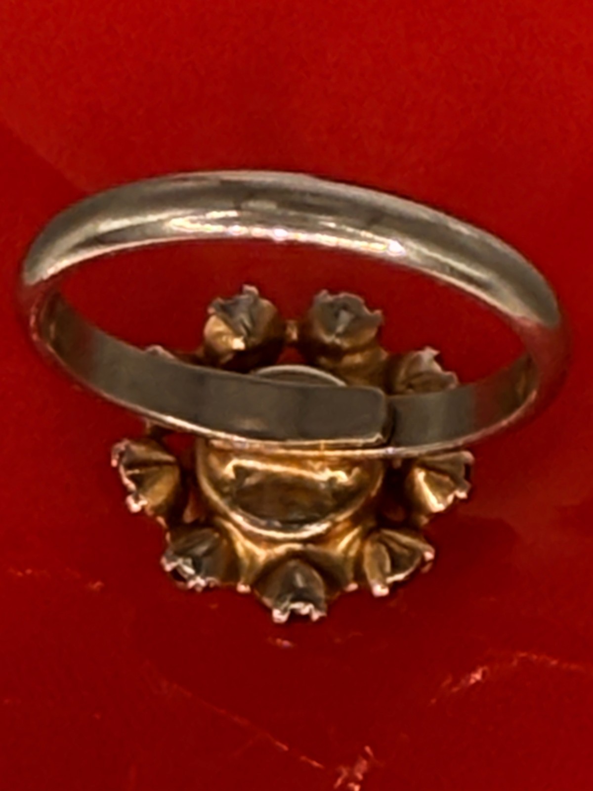 Deep Burgundy ring features a cluster of red rhinestones in a gold-tone setting.