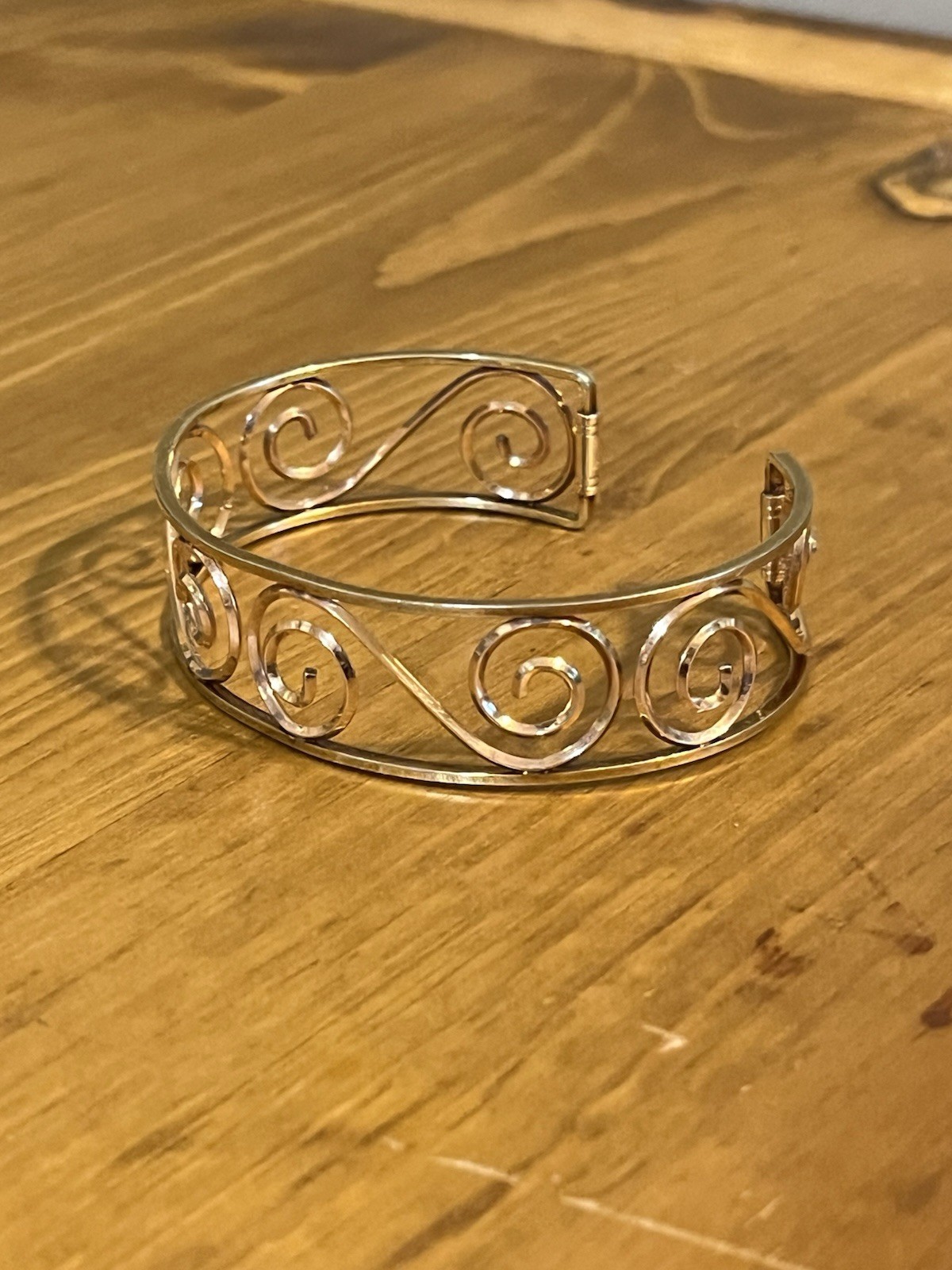 Krementz scroll work cuff spiral design on gold tone open back 6” 1950-60s