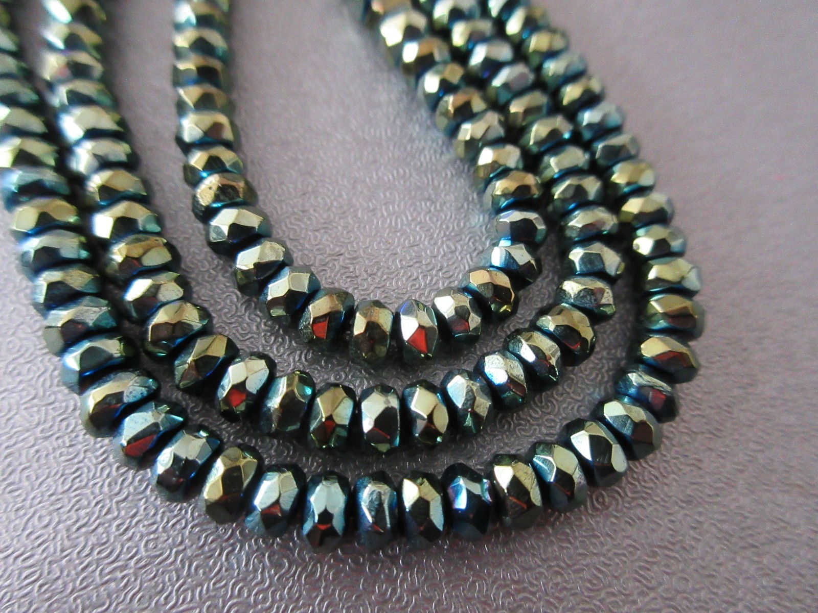 Hematite Green Metallic Electroplated Roundell 4mm Beads 16 Inches Long