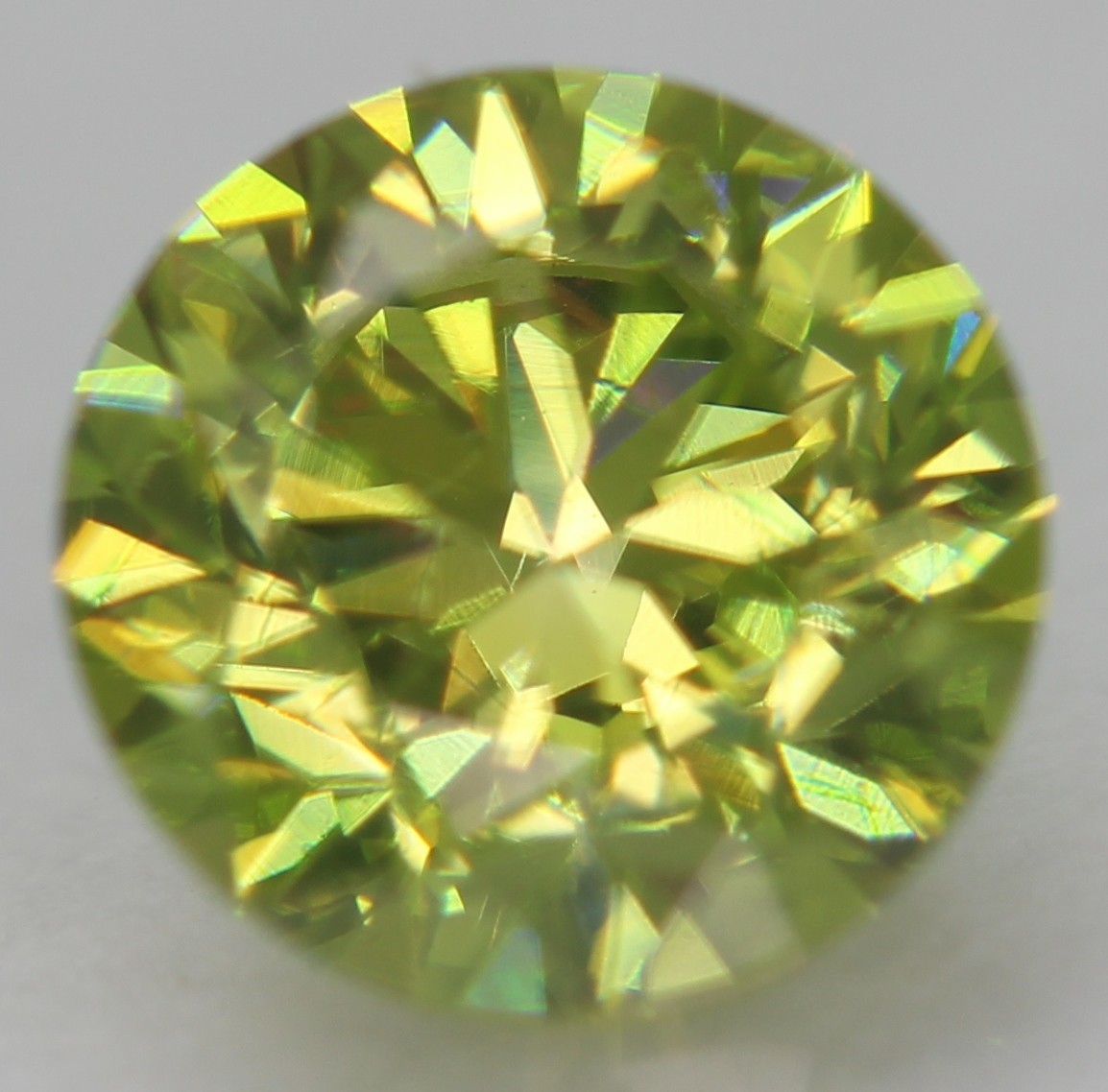 Cert 0.57 Carat Vivid Green VVS1 Round Brilliant Natural Enhanced Diamond 5.23mm