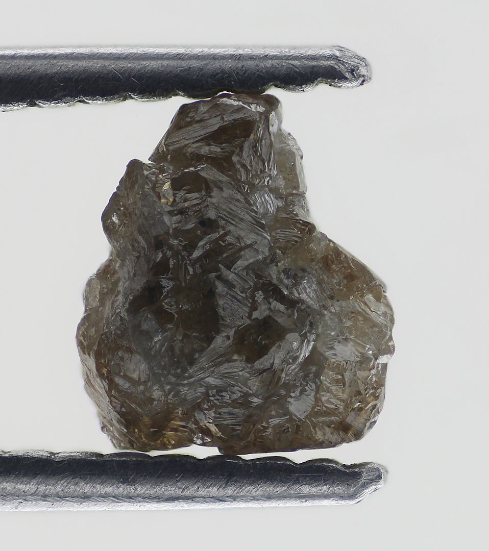 Brownish Fancy Rough Natural Loose 1.45 Carat With 7.21×6.43×4.43MM Diamond
