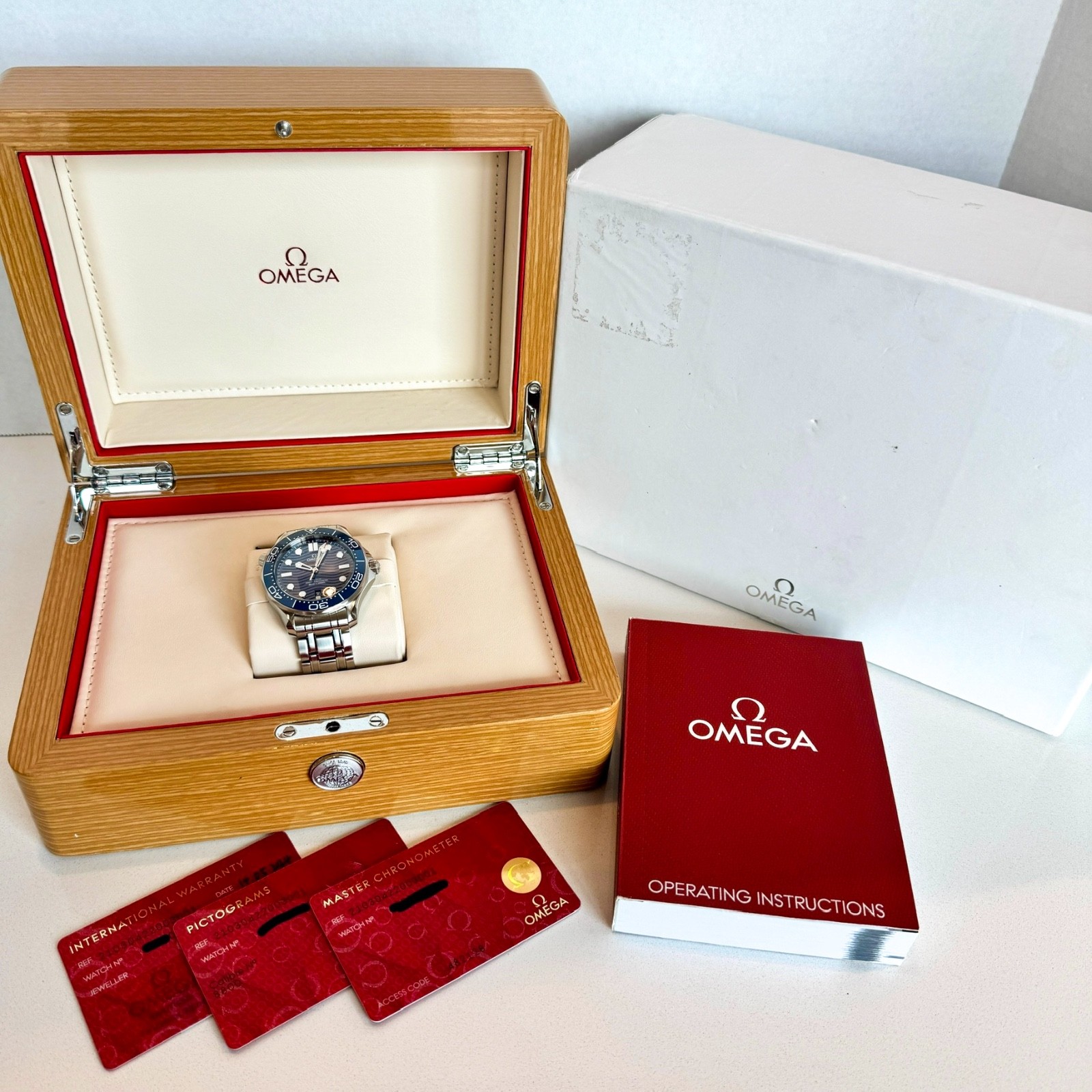 2024 Omega Seamaster Diver 300M Blue Wave Ceramic 42mm B&P 210.30.42.20.03.001