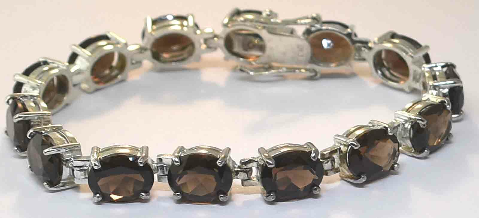 SILVER STERLING SMOKEY TOPAZ 42 CARAT BRACELET