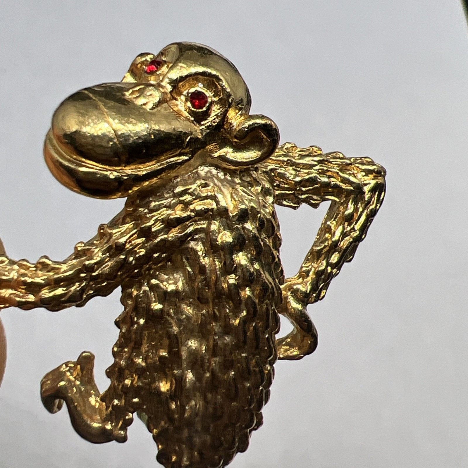 Vintage Signed Gerry’s Gold Tone Monkey Ape Figural Brooch Textured Red Rhinesto