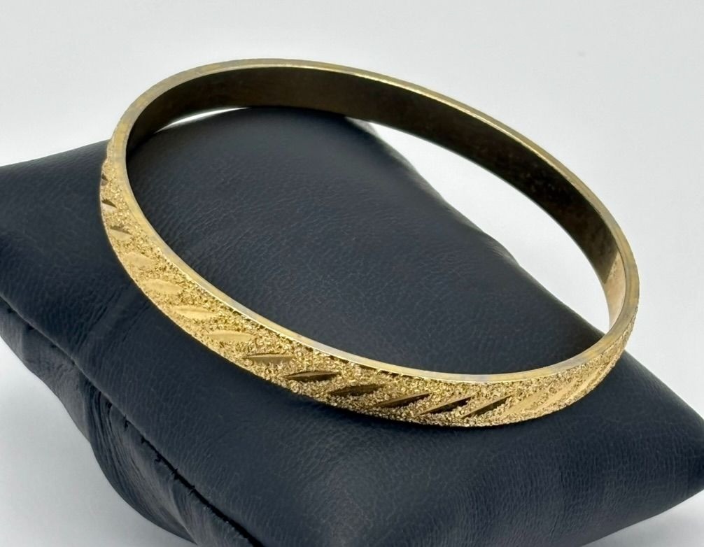 Vintage Monet Etched Textured and Shiny Gold-Tone Bangle Bracelet Signed 8-1/8″
