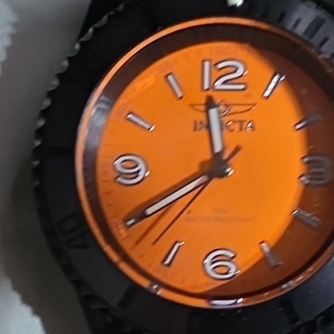 Invicta Men’s Quartz Analog Wristwatch 100m 44-47.9mm Orange Dial Black