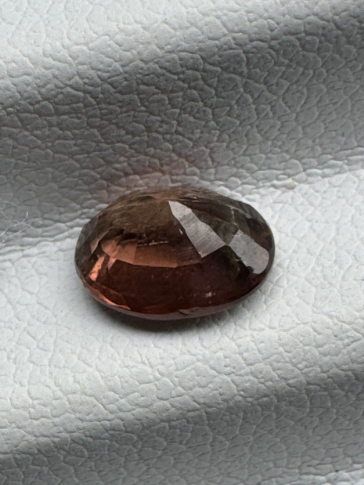 TOURMALINE. Cognac Oval, Very Slight Inclusion. 7.9 X 6.1 mm, 1.27 Carats.