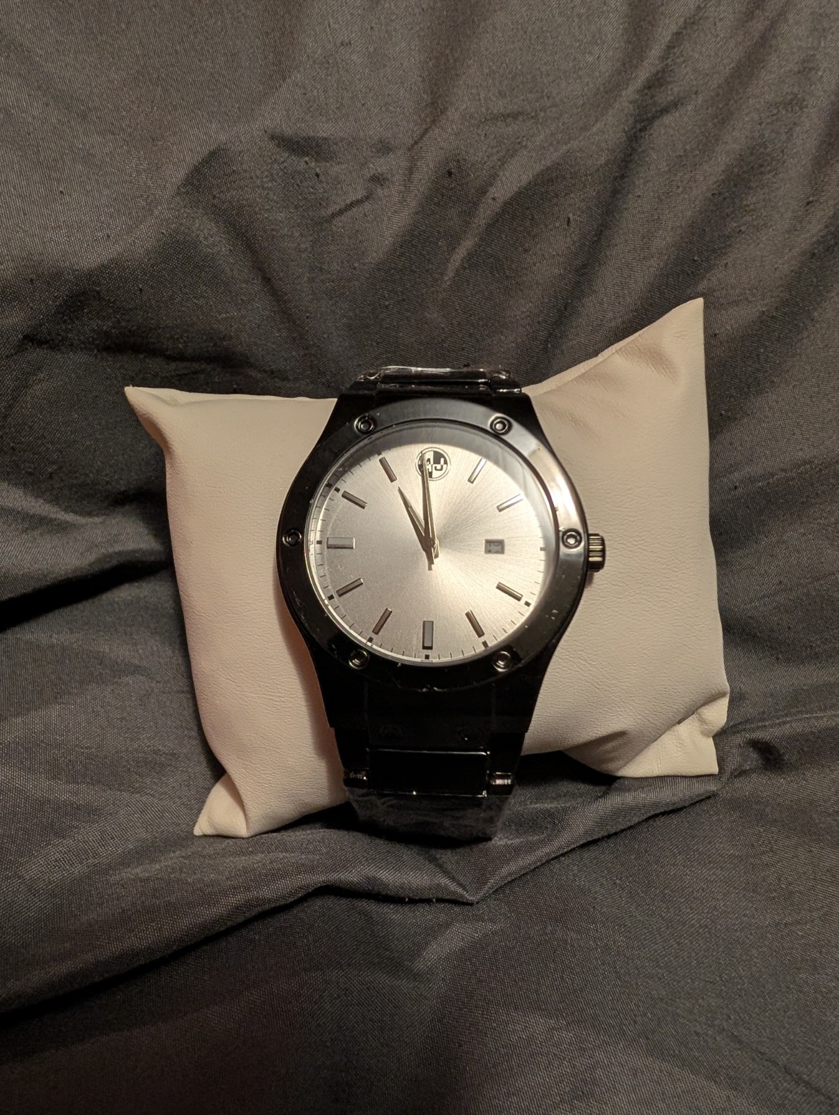 AJ Silver Round Analog Wristwatch Date Indicator Black Metal band USA made.