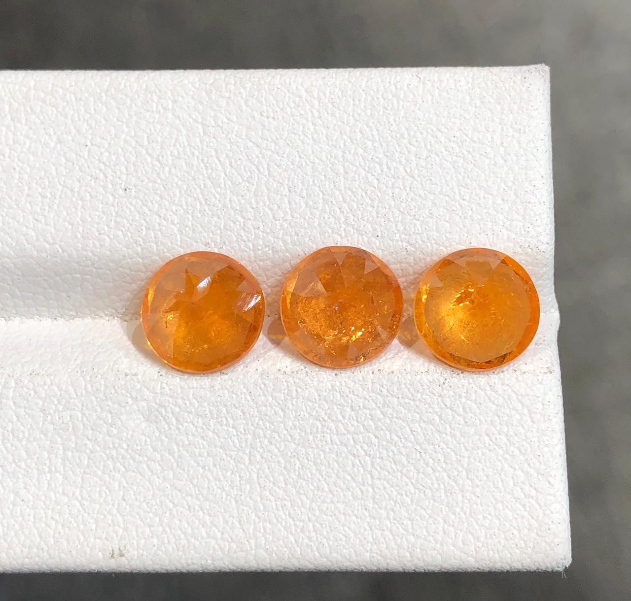 7.69 carat Natural Spessartite Garnet for earrings with Round shape from Africa