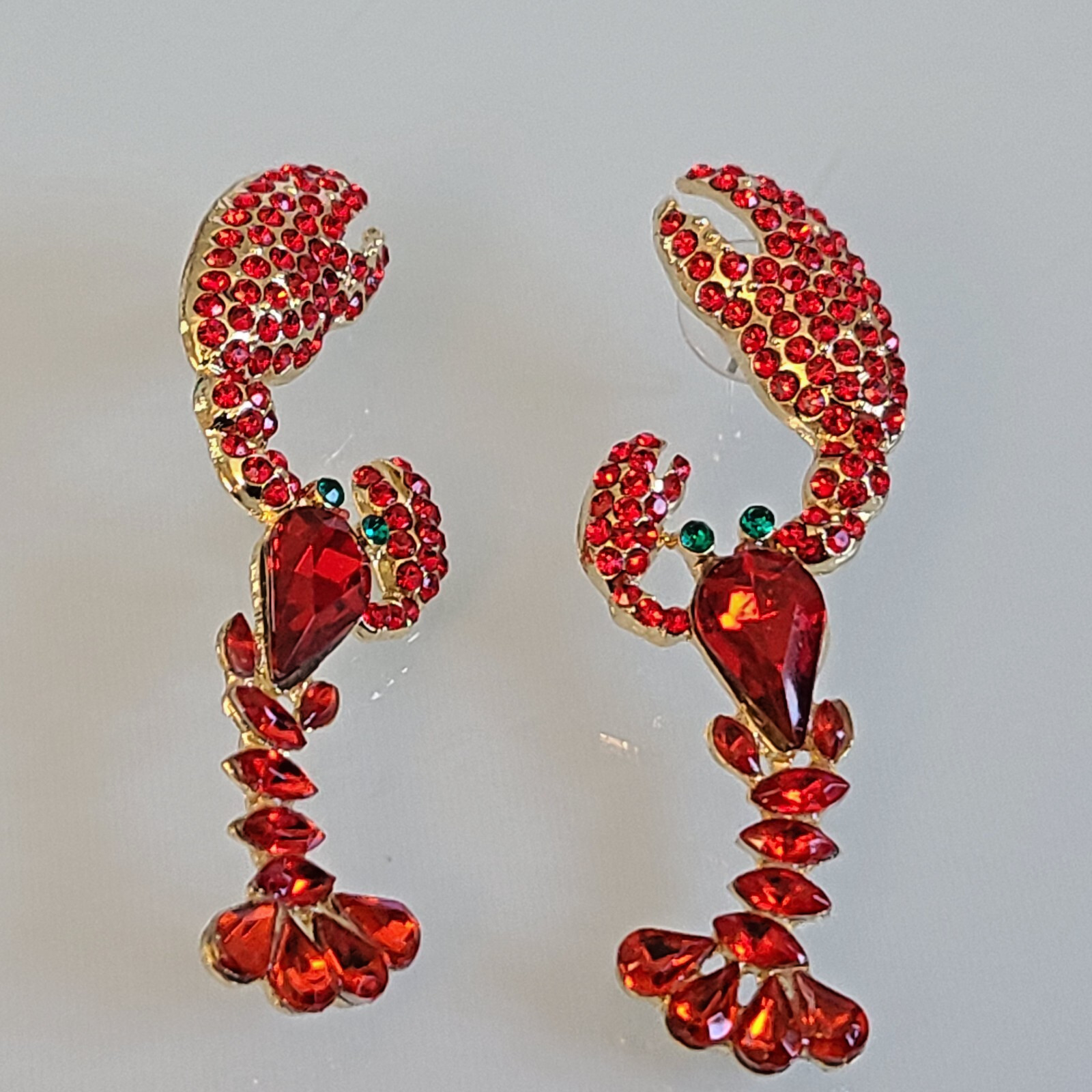 GORGEOUS RED RHINESTONE LOBSTER EARRINGS WITH GREEN EYES CRYSTALS 21/4 INCHES