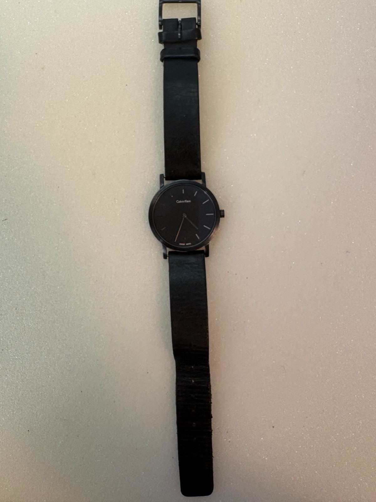 Calvin Klein Minimalist Quartz Watch featuring a sleek black dial- Works