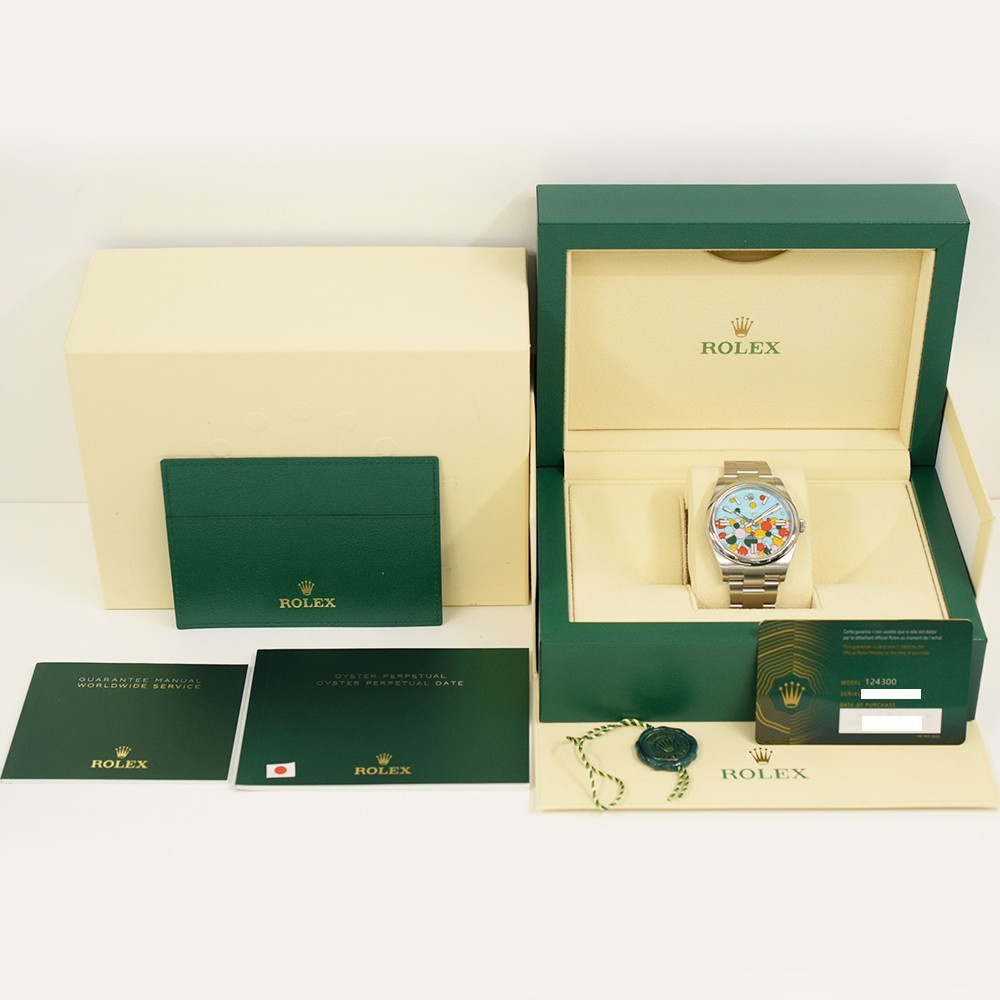 Rolex Oyster Perpetual 41 124300 Celebration Dial Steel Box & Papers Mint