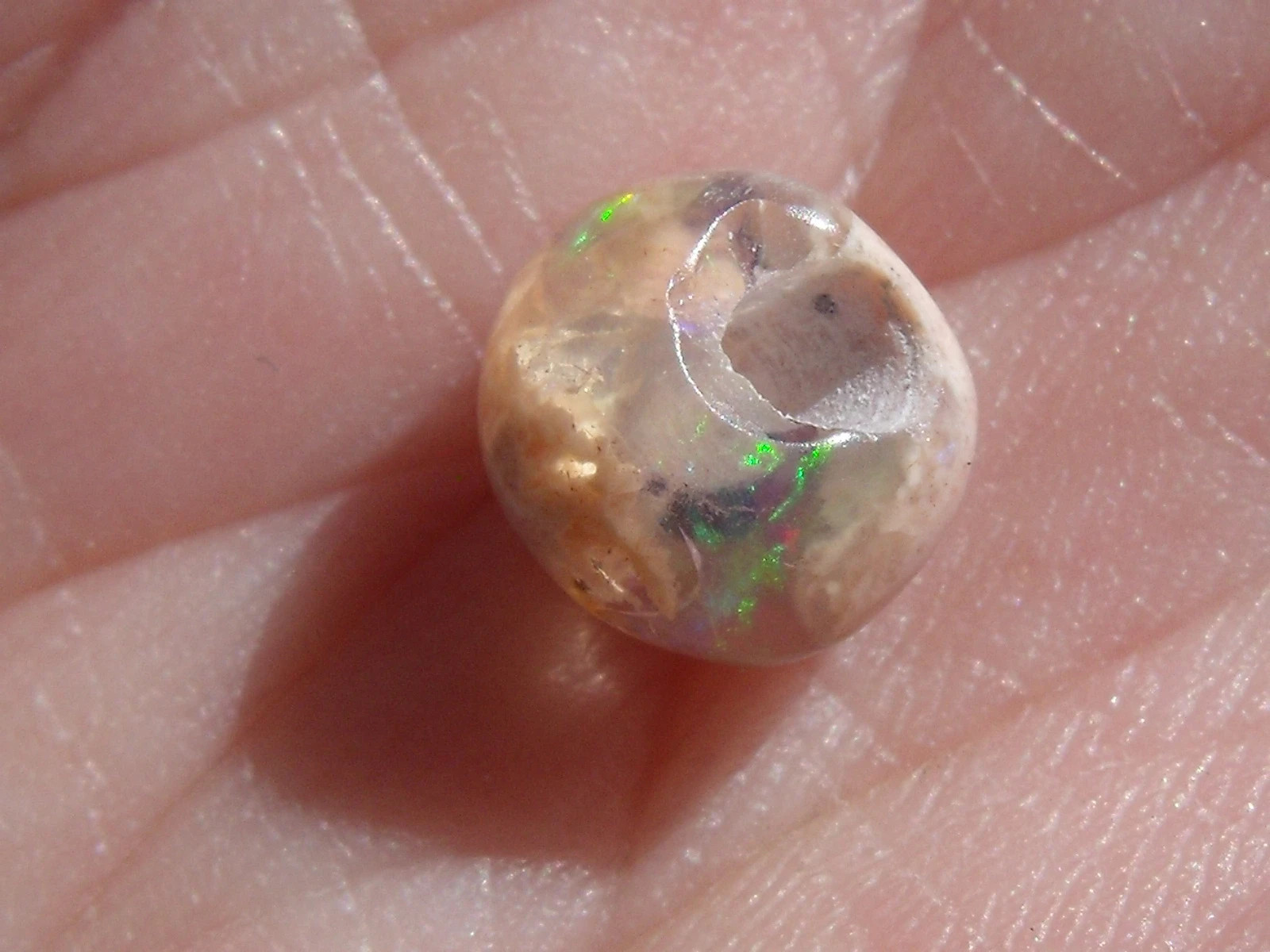 1.91 Ct. Round Cut Mexican Cantera fire opal bead.