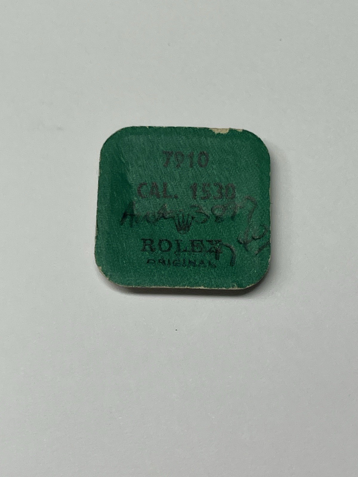 Rolex 1530 – 7910. Pinion For Oscillating Weight. New In Blister Pack.