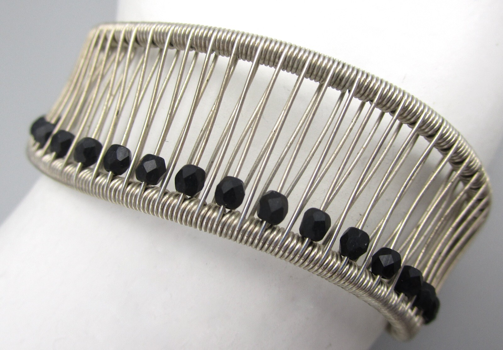 ARTISAN TANA ACTON STERLING SILVER ONYX ASYMMETRIC WAVE KINETIC CUFF BRACELET