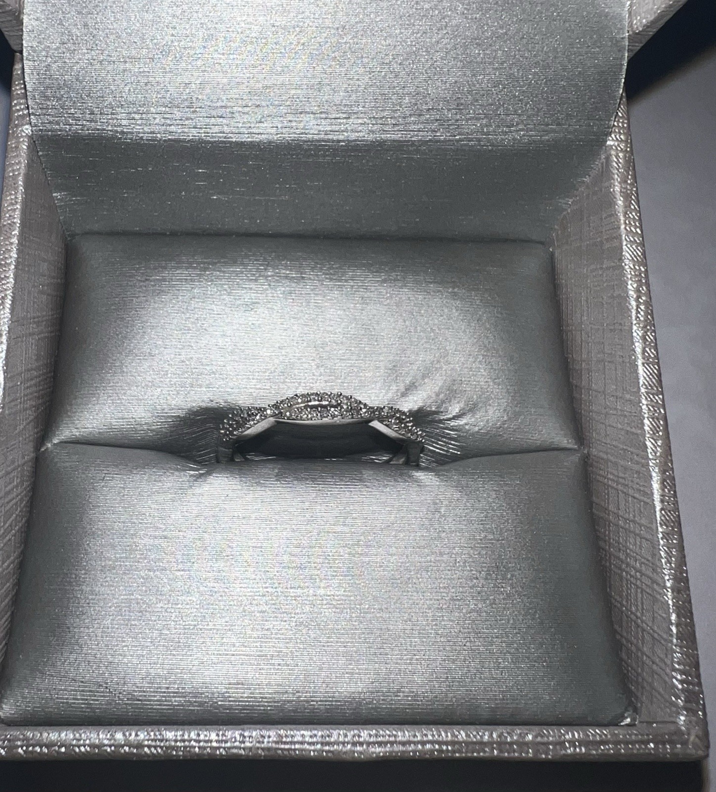 1/8 CT. T.W. Diamond Twist Stackable Wedding Band in 10K White Gold Retails $779