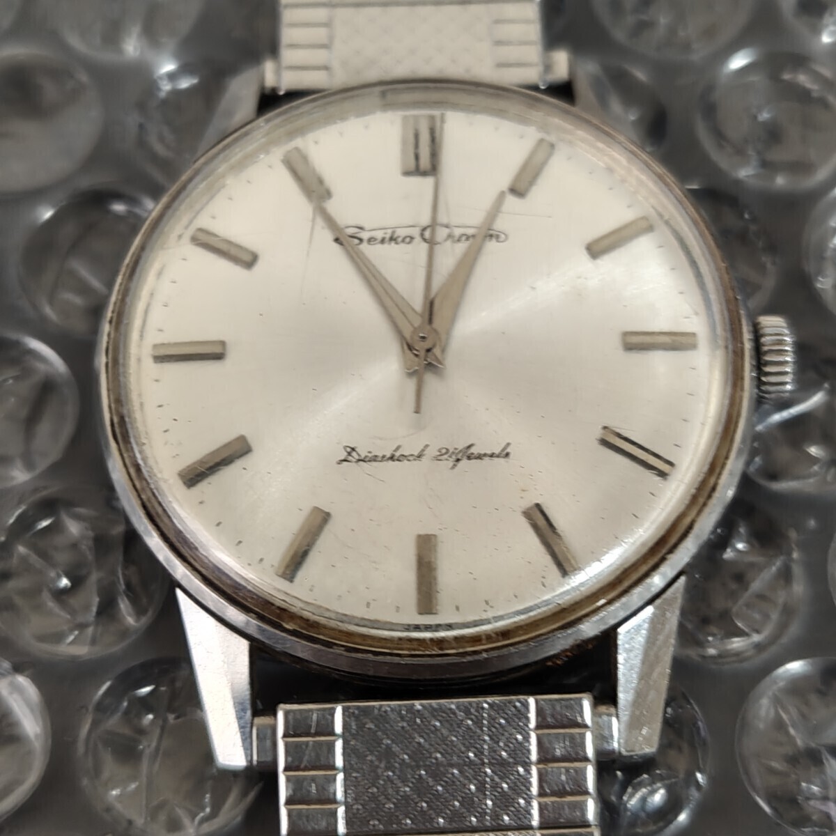 Working SEIKO 16002 Crown Diashock 21 Jewels Silver Dial Manual Wind Men’s Watch