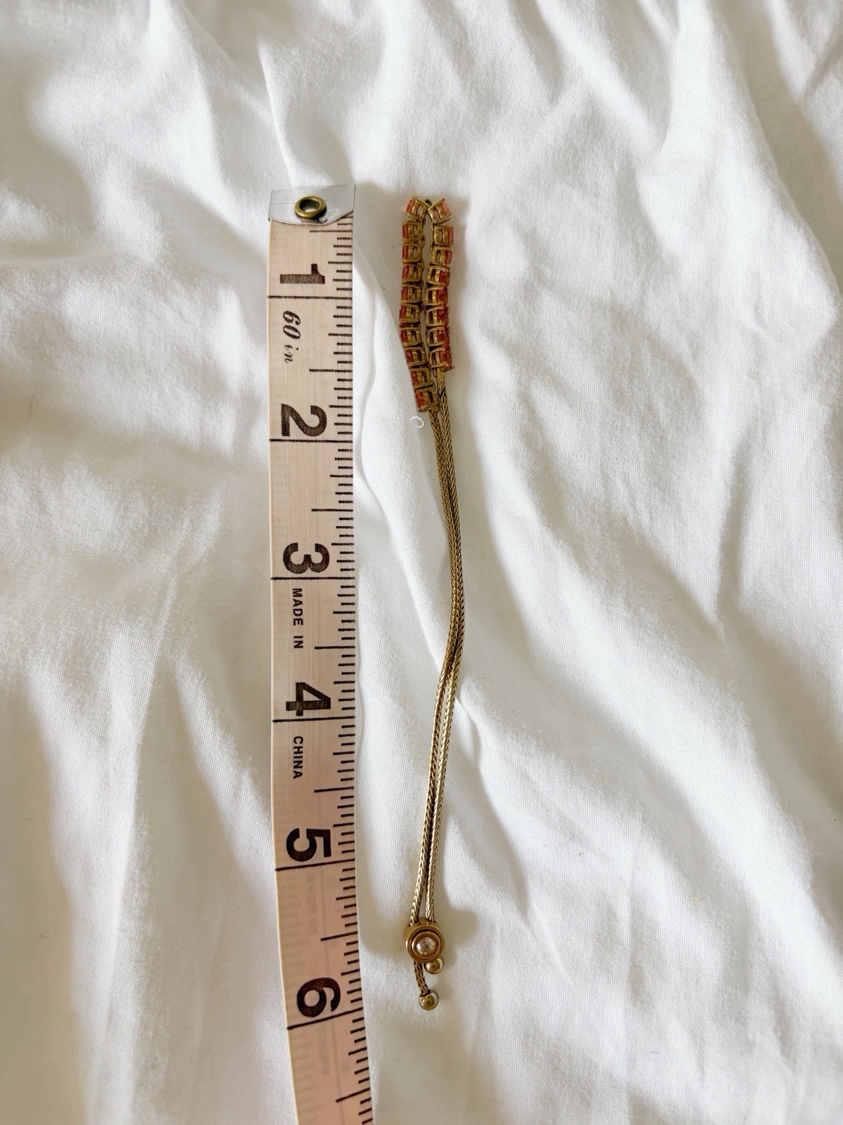 GIVENCHY Gold-Tone Pink Crystal Adjustable Slider Bracelet