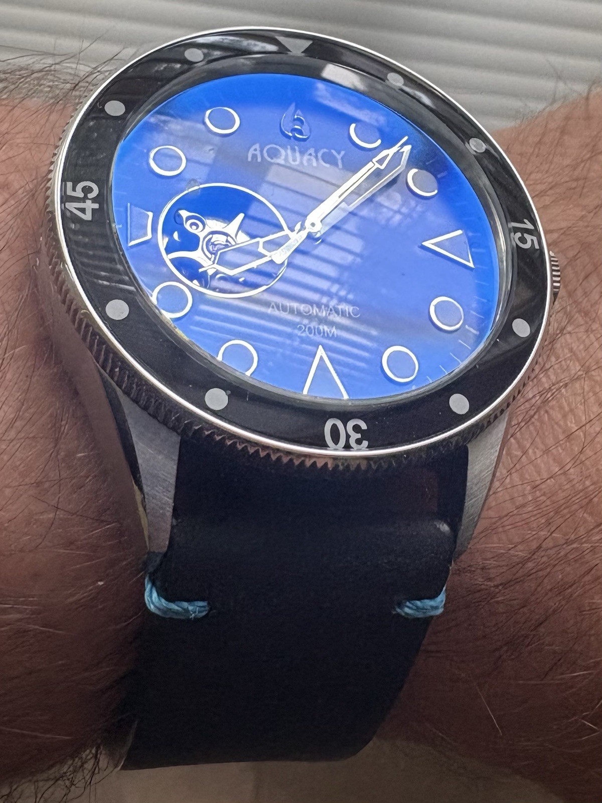 Aquacy Men’s Hei Matau Cave Diver Open Heart Blue MOP Automatic 42mm Watch
