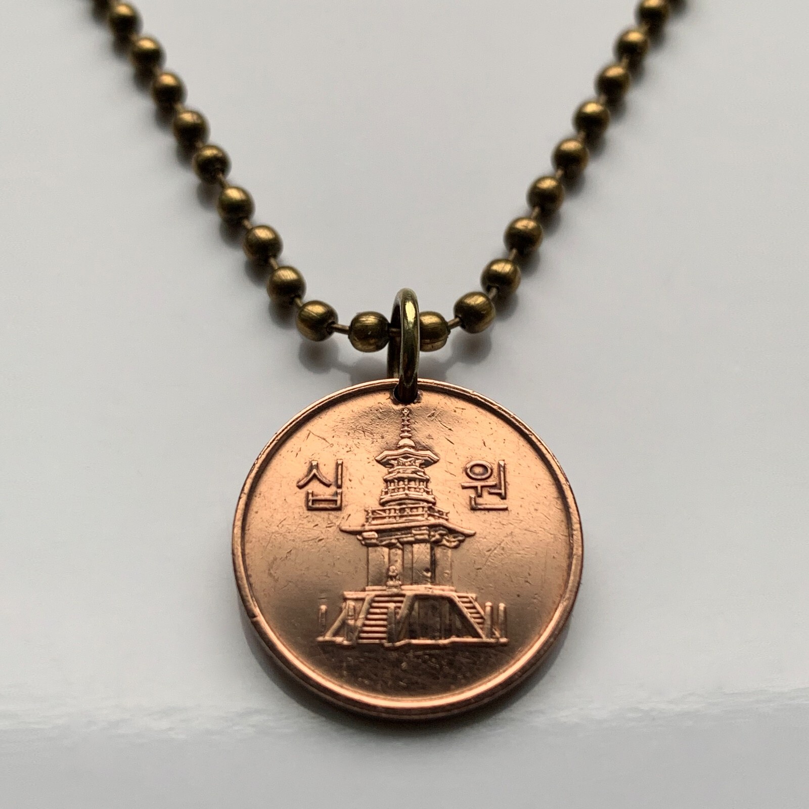 2007 South Korea coin pendant stone Dabotap Pagoda temple Bulguksa Seoul n000549
