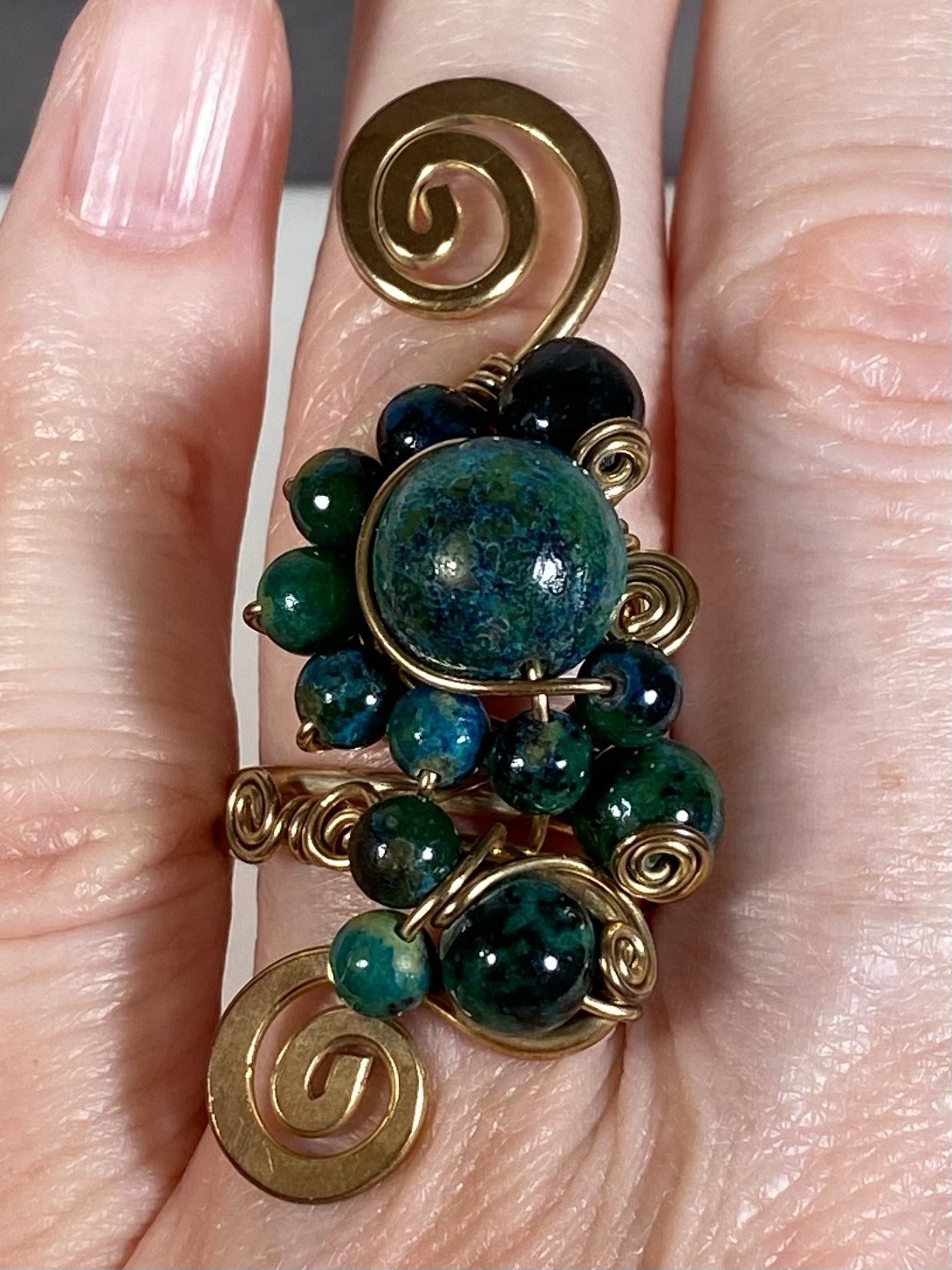 Handmade ring, green and blue gemstones, wire-wrapped in gold-toned metal
