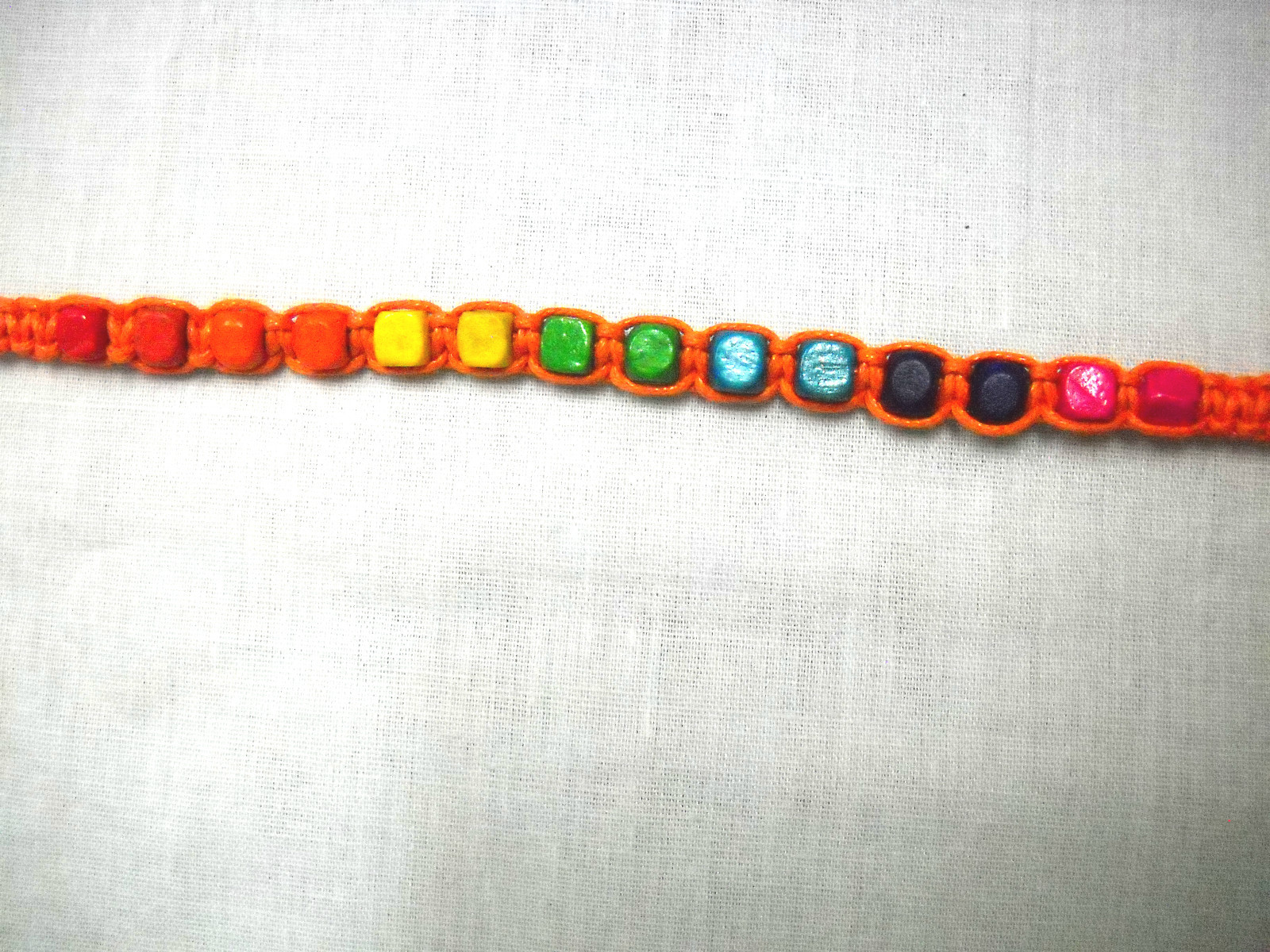 FUN ORANGE MACRAME w RAINBOW WOOD BEADS BLUE GREEN RED TIE ON BRACELET OR ANKLET