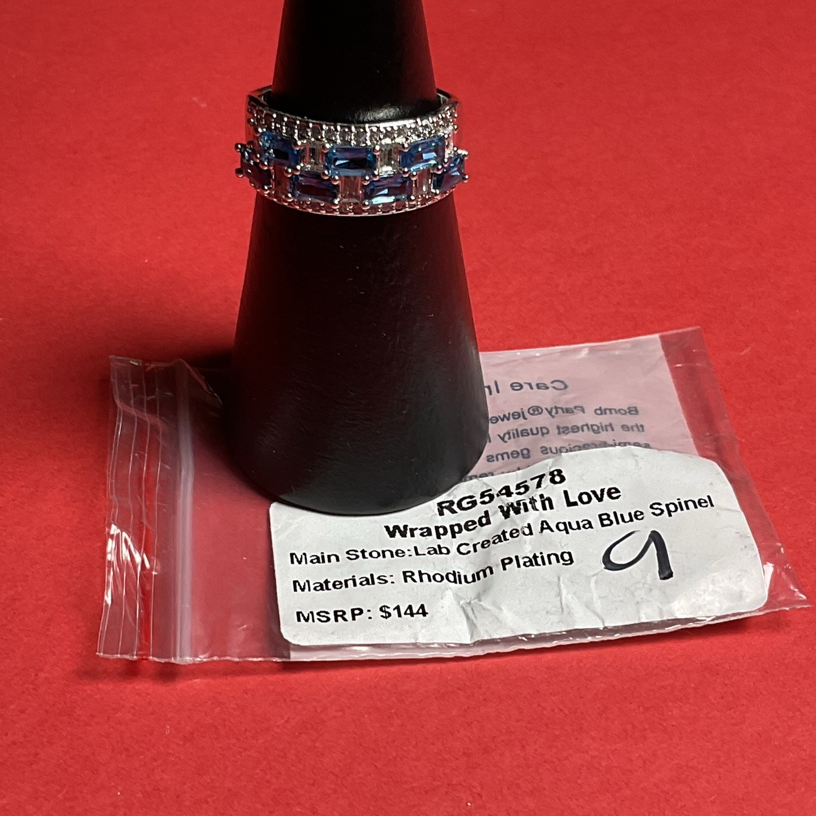 Bomb Party RG54578 “Wrapped With Love” Lab Created Spinel Rhodium Sz 9 Ring NWT