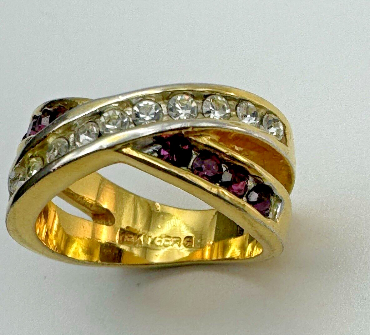 18kt Gold Plated Crossover Ring Signed GERG Clear Purple Amethyst Color Stones
