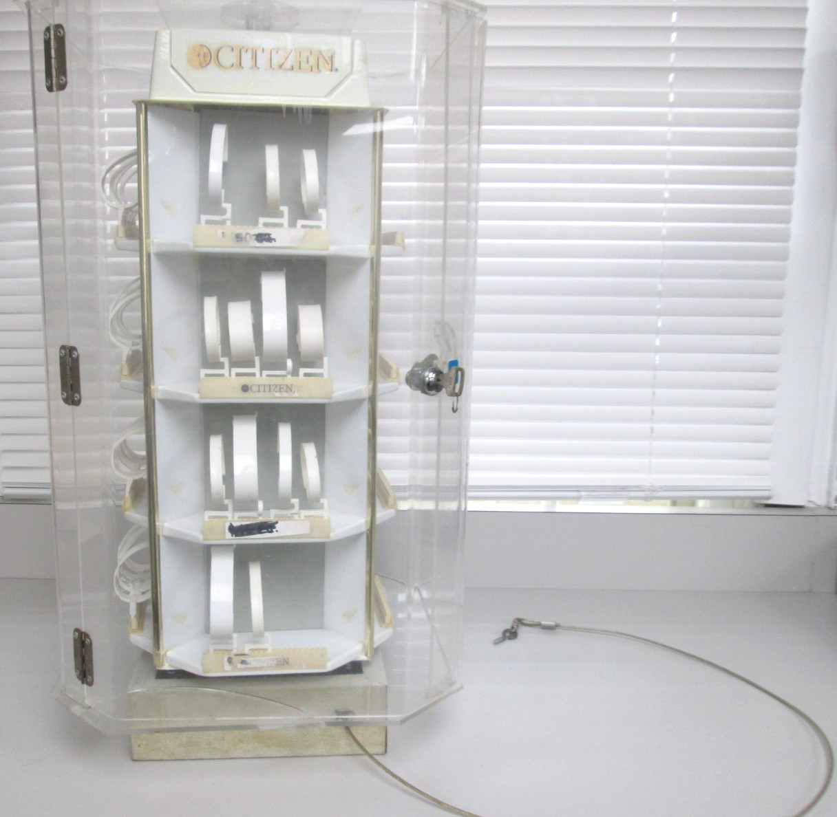 CITIZEN ROTATING COUNTER TOP WATCH DISPLAY WITH LOCK AND SECURITY CORD