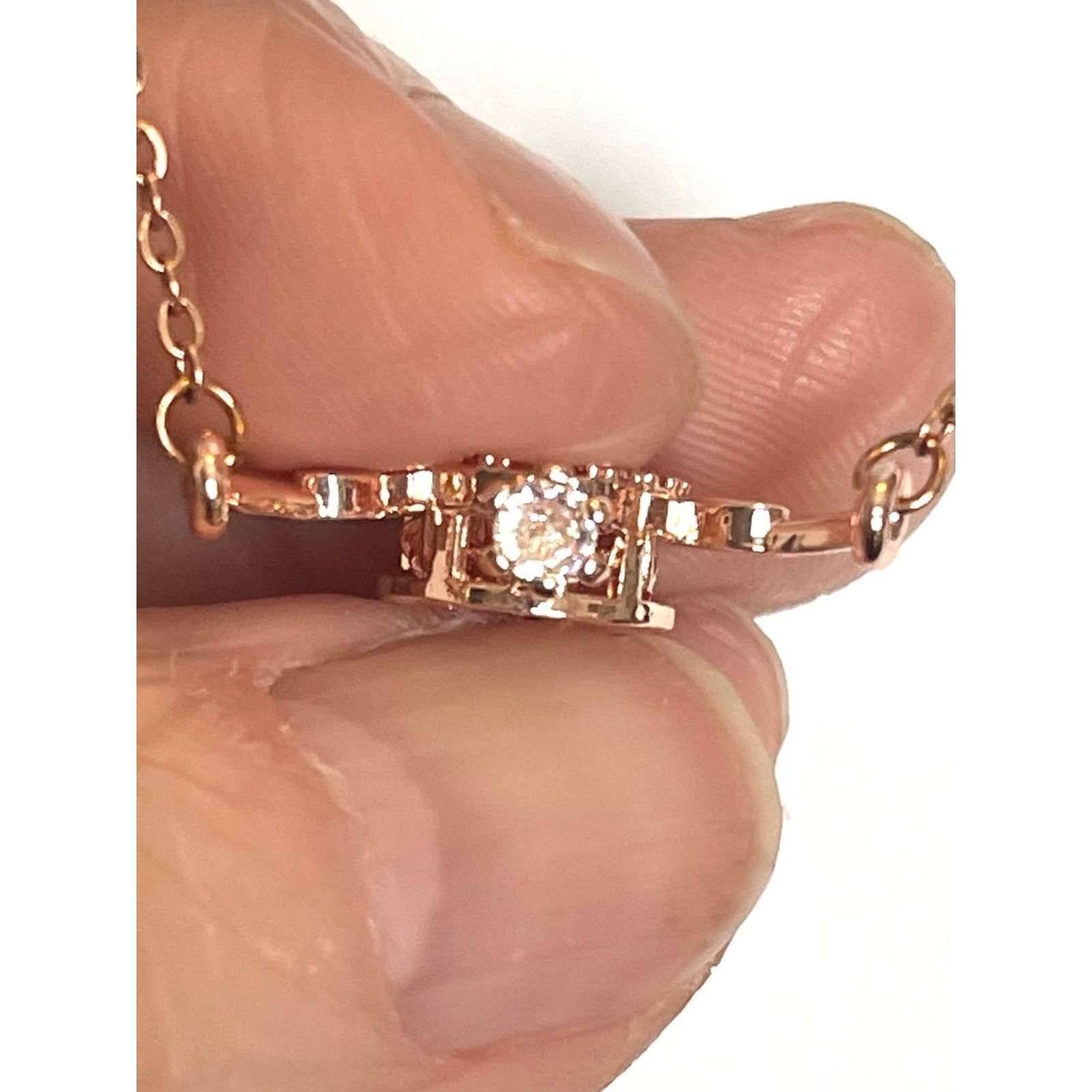 Rose Gold Over Stainless Angel Wing Trimbler Necklace, CZ’s Lobster Claw Clasp