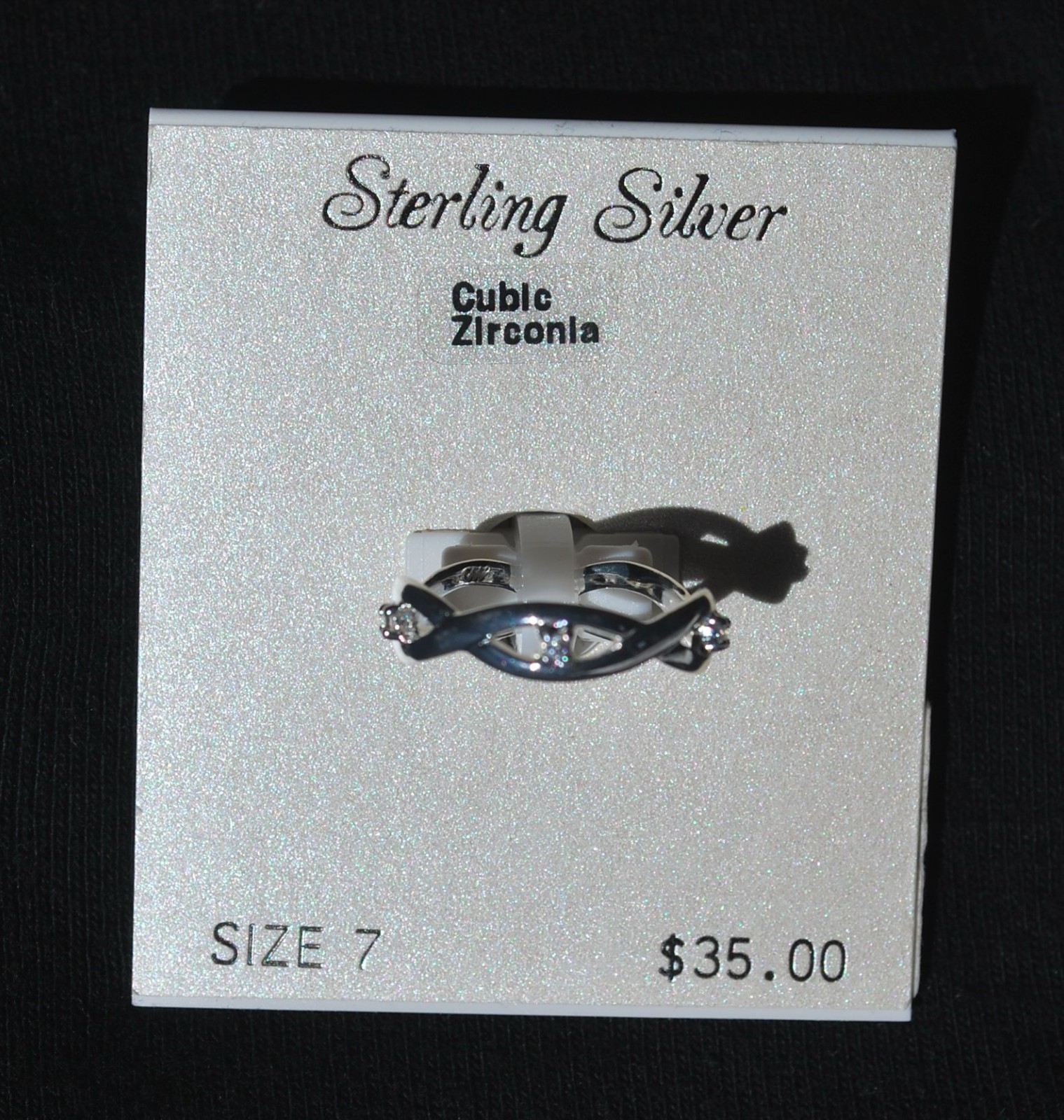 NWT – Sterling Silver Cubic Zirconia ring (size 7) weave design – MSRP $35