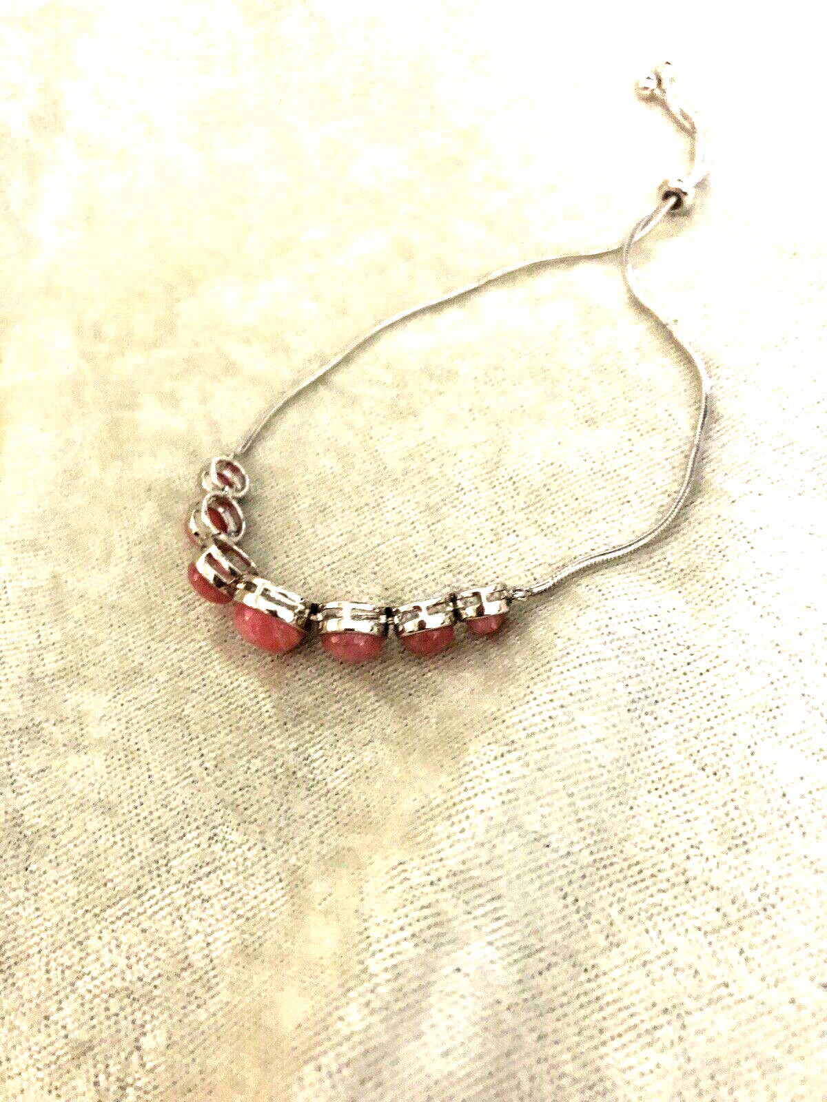 GENERATION GEMS ROUND PINK RHODOCHROSITE GEMSTONE SS ADJ. BRACELET (M4339-24)