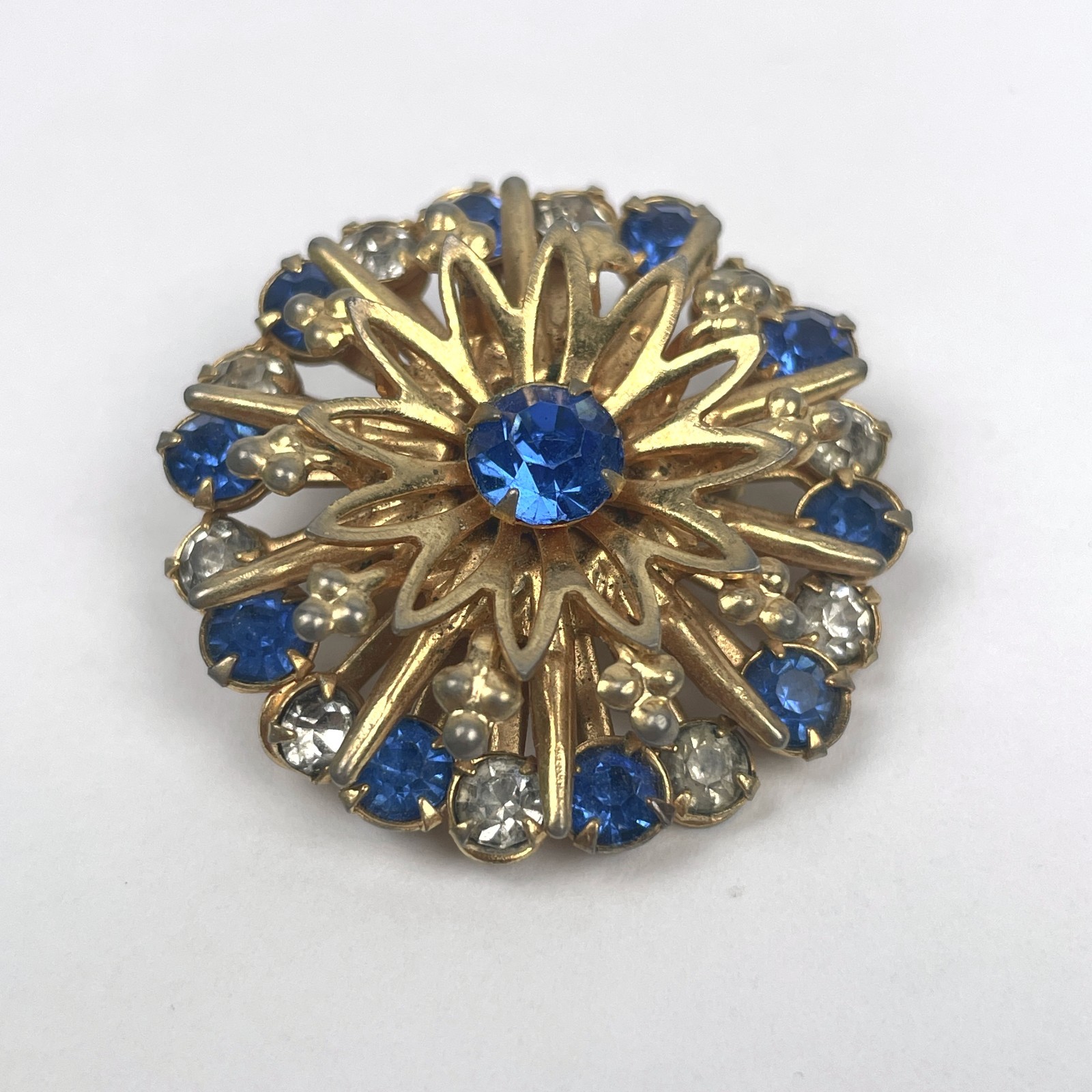 VTG 50s 60s Gold Tone Sunburst Medallion Brooch Blue Clear Rhinestone Pin