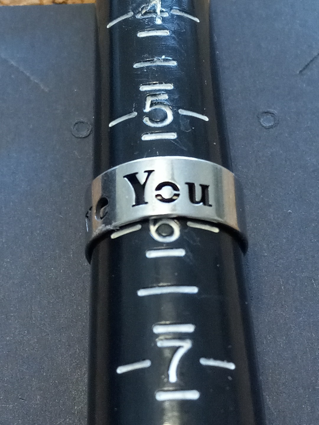 Stainless Steel Fashion Ring – Stamped Love You. 7mm Wide. Size 5.5 (B20)