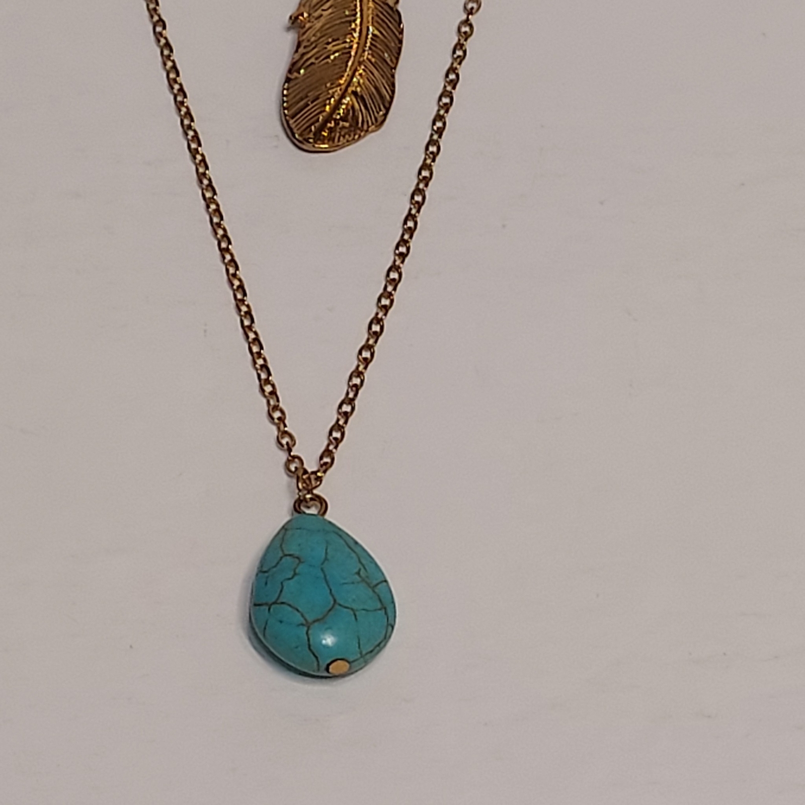 Multi Layered Gold Necklace With Feather & Turquoise Stone