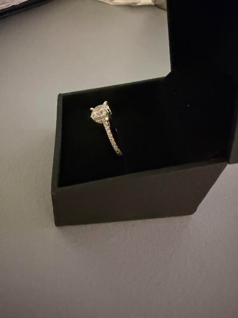 2.02 carat diamond ring. Round Brilliant single diamond, diamonds around band.