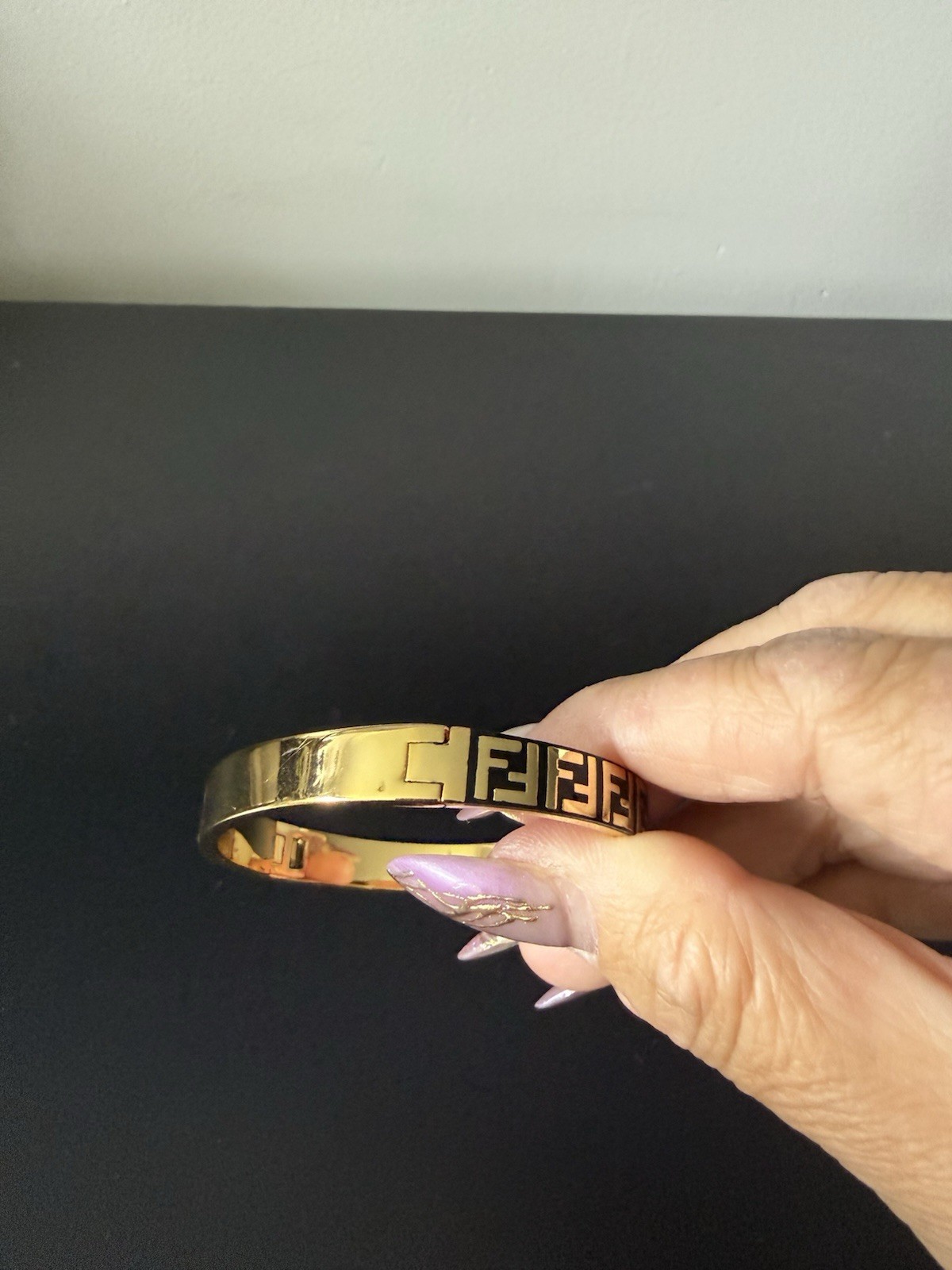 Fendi FF cuff bracelet gold and black size M