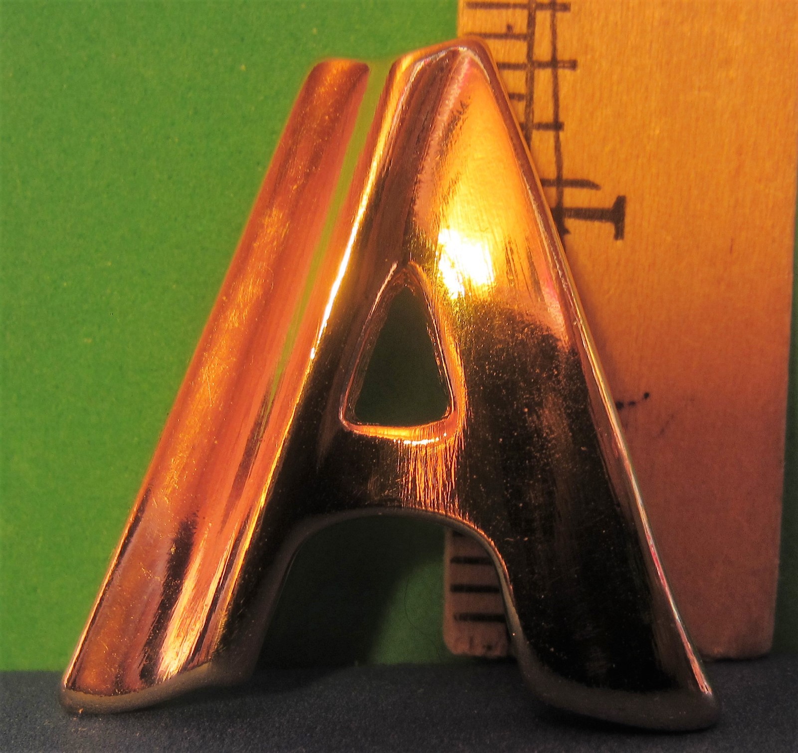 Un-marked Gold-tone A Shaped Pin/Brooch 1 1/4″ by 1 1/4″