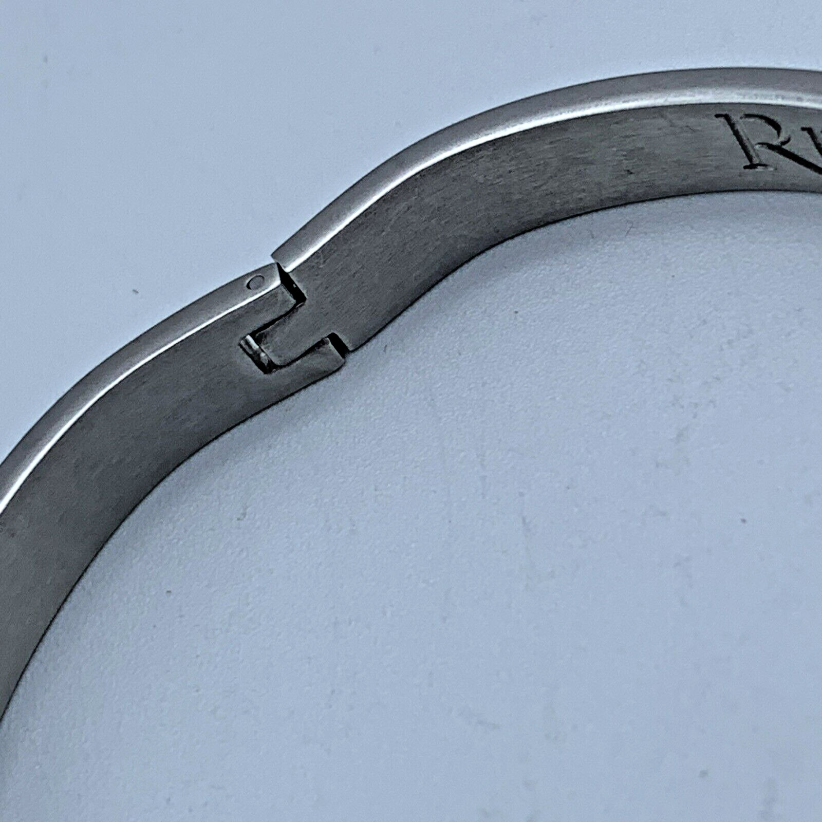 Rustic Cuff 7.25 in Cindy Silver Tone Hinged Bangle Bracelet w/ Bow Accent B4-23