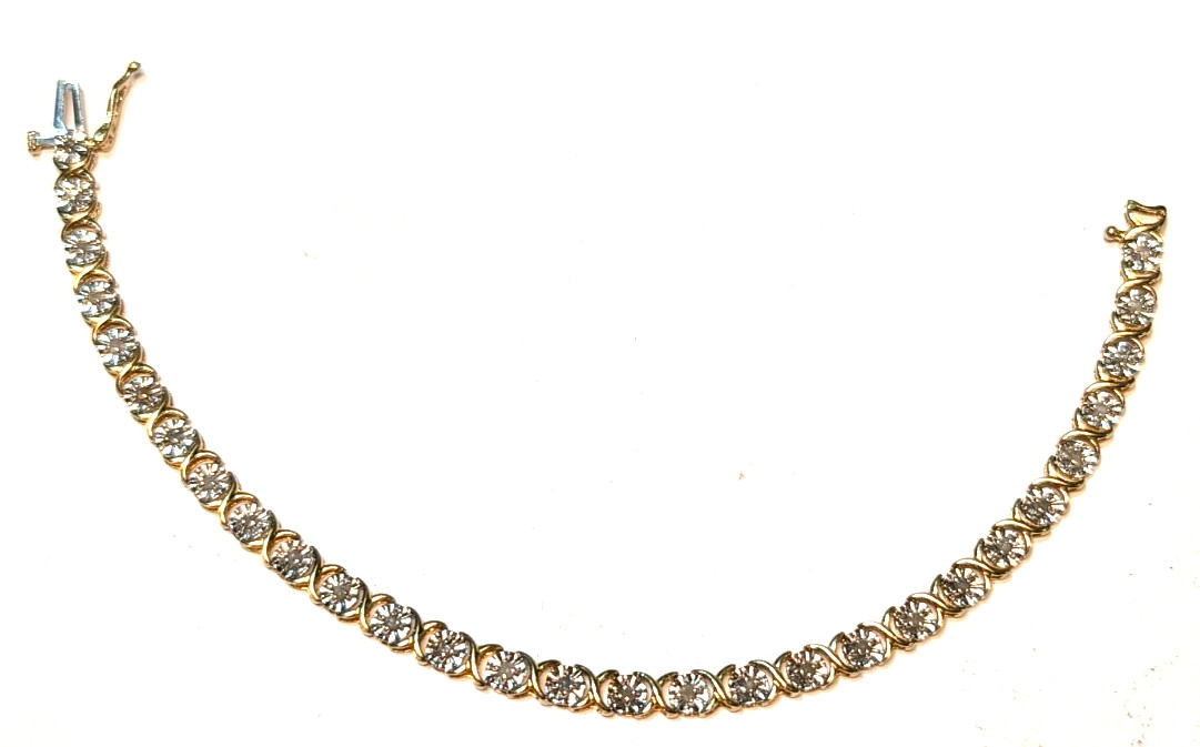 10K YELLOW GOLD DIAMOND TENNIS BRACELET 7.50 INCHES LONG & 6.50 GRAMS