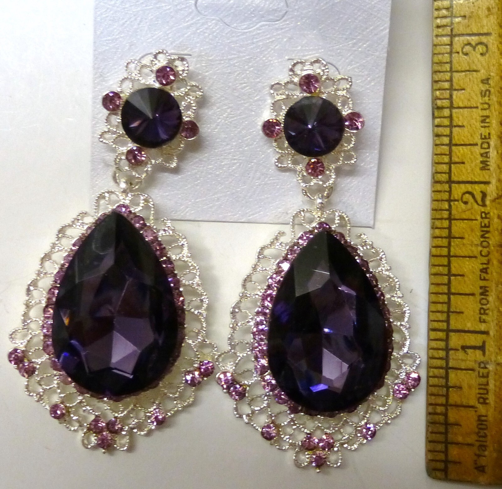 earrings – purple surrounded by rhinestones 2 1/2 inches