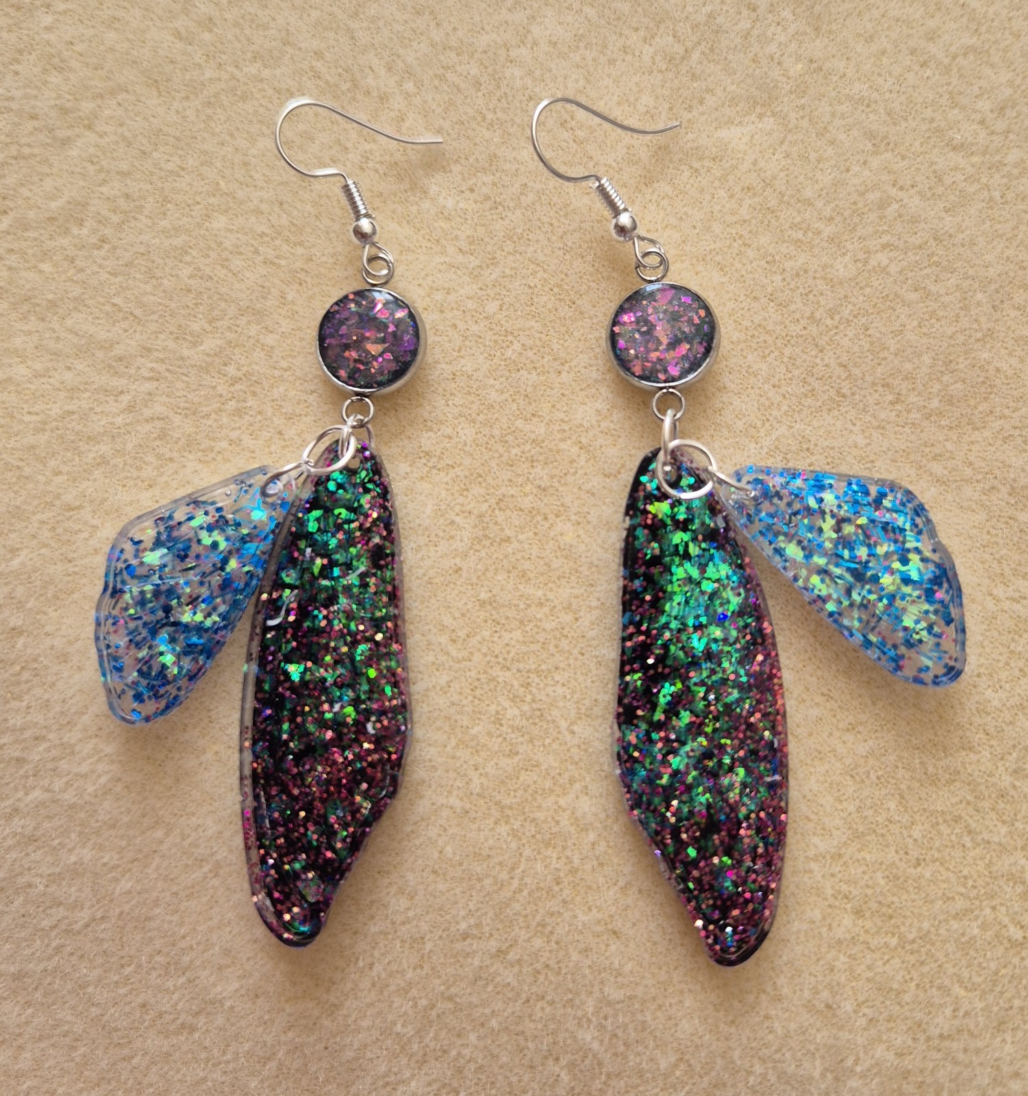 beautiful long glittery butterfly wings resin earrings 8cm with hook fastening