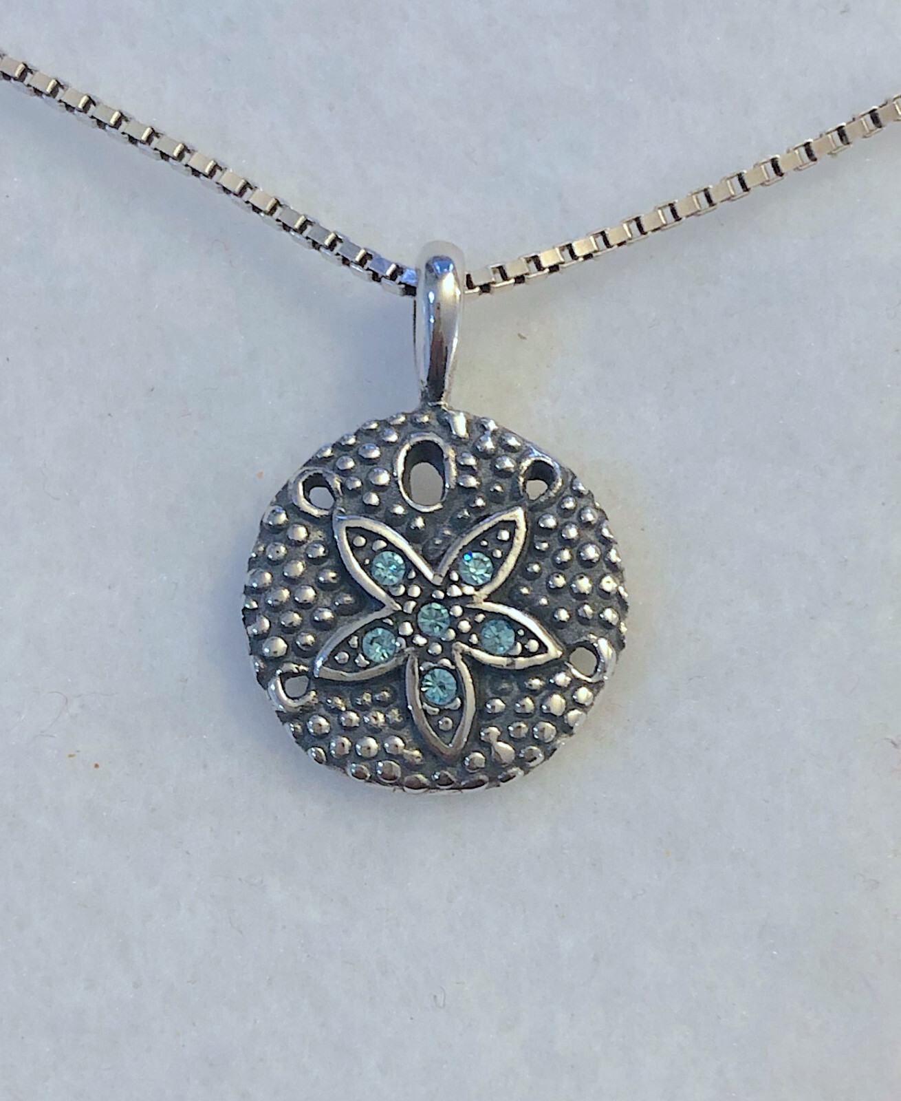 Wildthings Sterling Silver Sand Dollar Pendant w/Faceted Aqua Crystal Stones