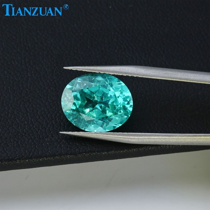 Synthetic YAG Oval Shape Neon Paraiba Color with inclusions loose Gemstones