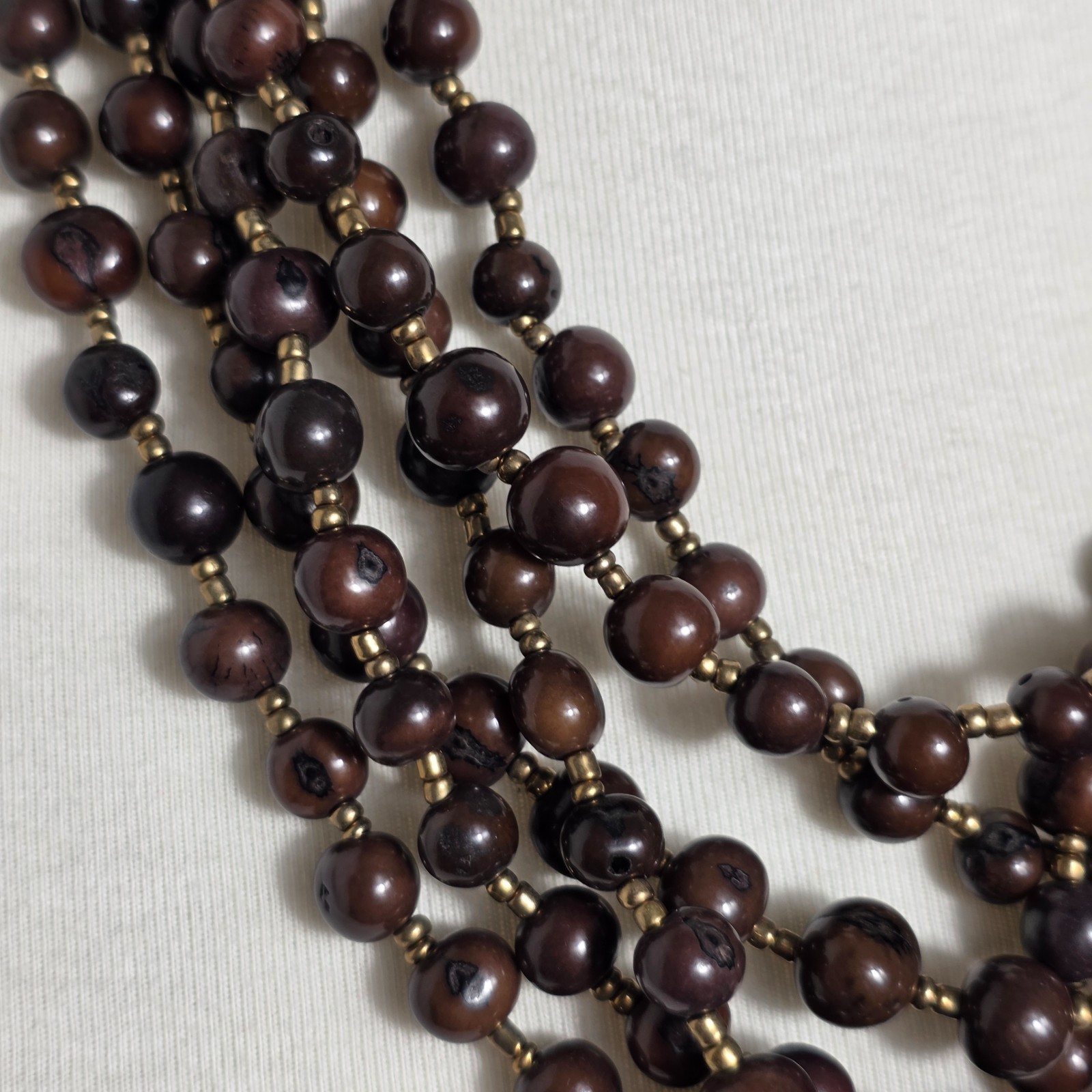 Multi-Strand Brown Acai Seed Bead Necklace with Gold Seed Bead Spacers