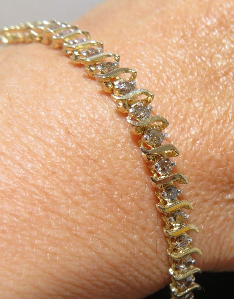 10K LADIES DIAMOND TENNIS BRACELET 1.00 tcw 7″ LONG 4.49 MM WIDE 6.42g(6132597-9