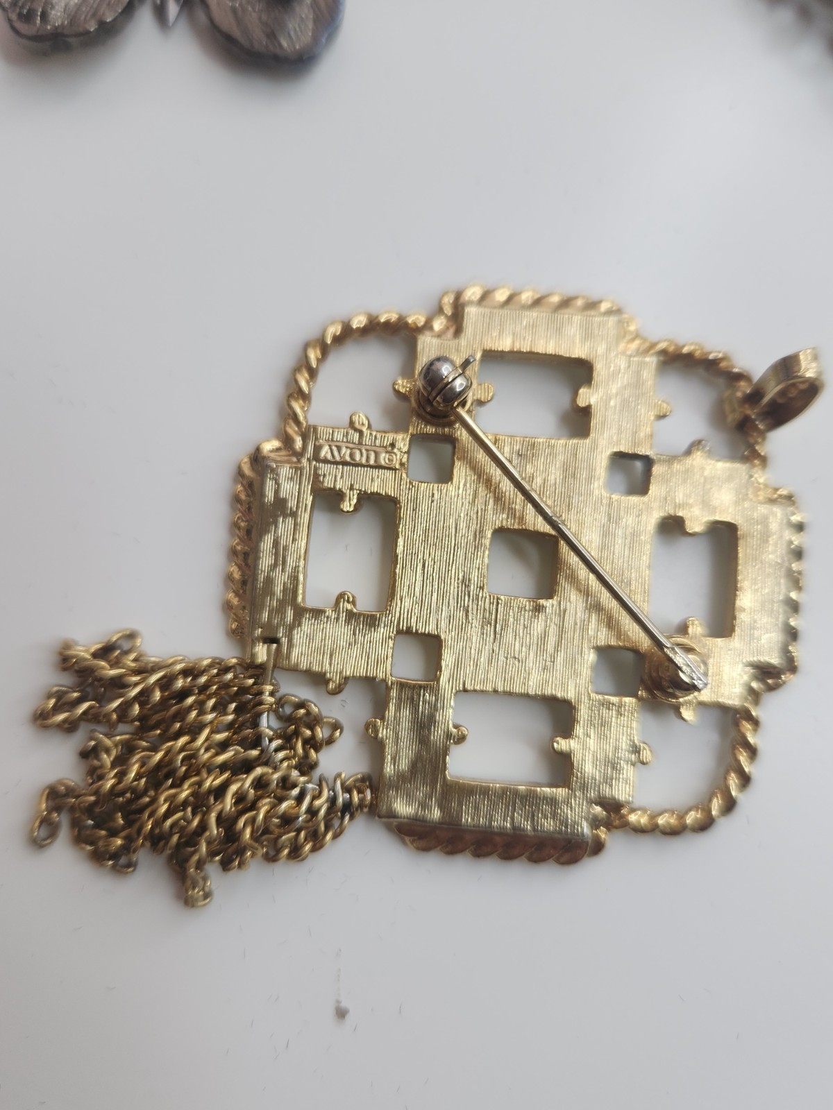 Avon Bow Brooch Vintage Gold Tone With White Enamel And Dangle Tassel Signed Pin