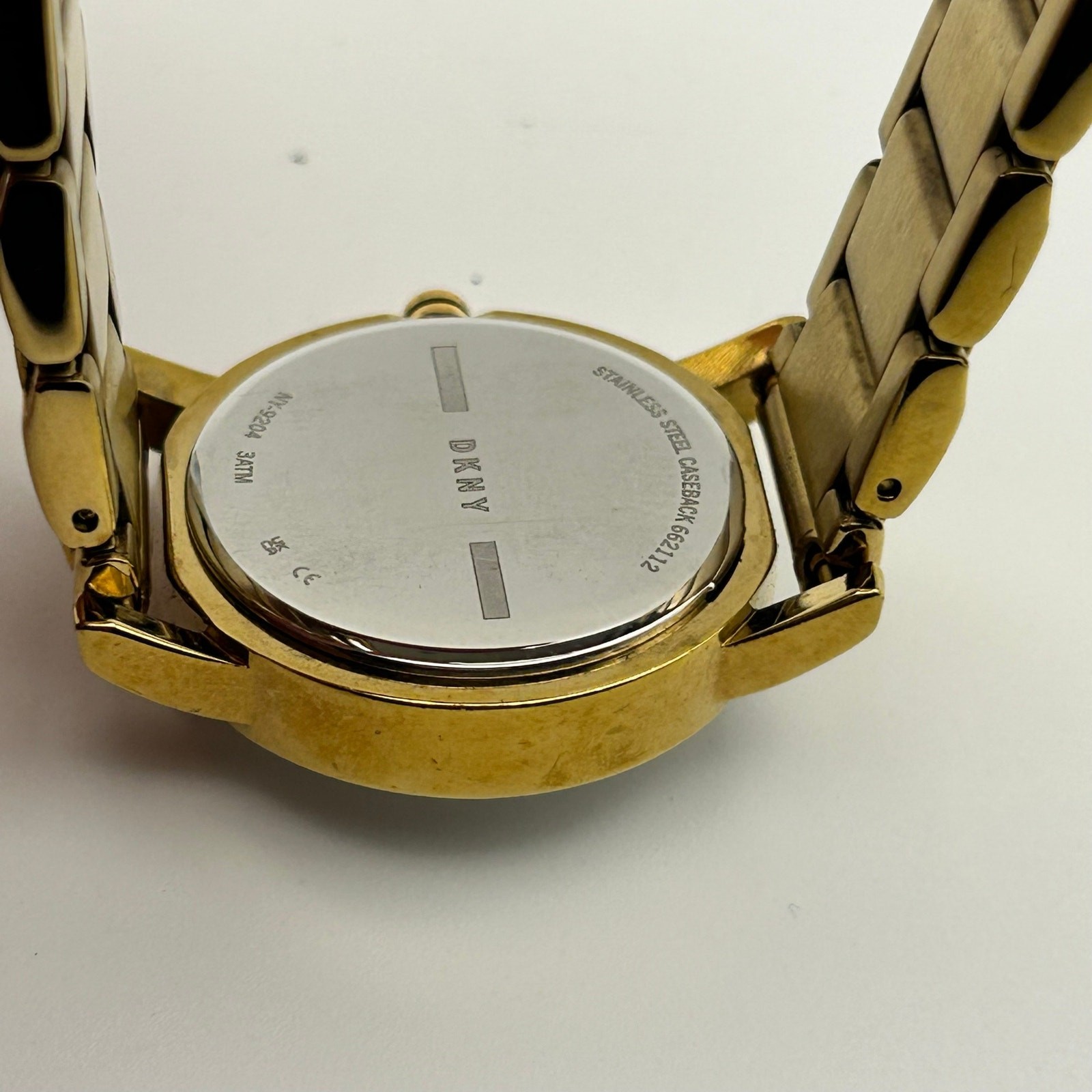 DKNY Soho Gold-tone Crystal Bezel White Dial St. Steel Watch New Battery